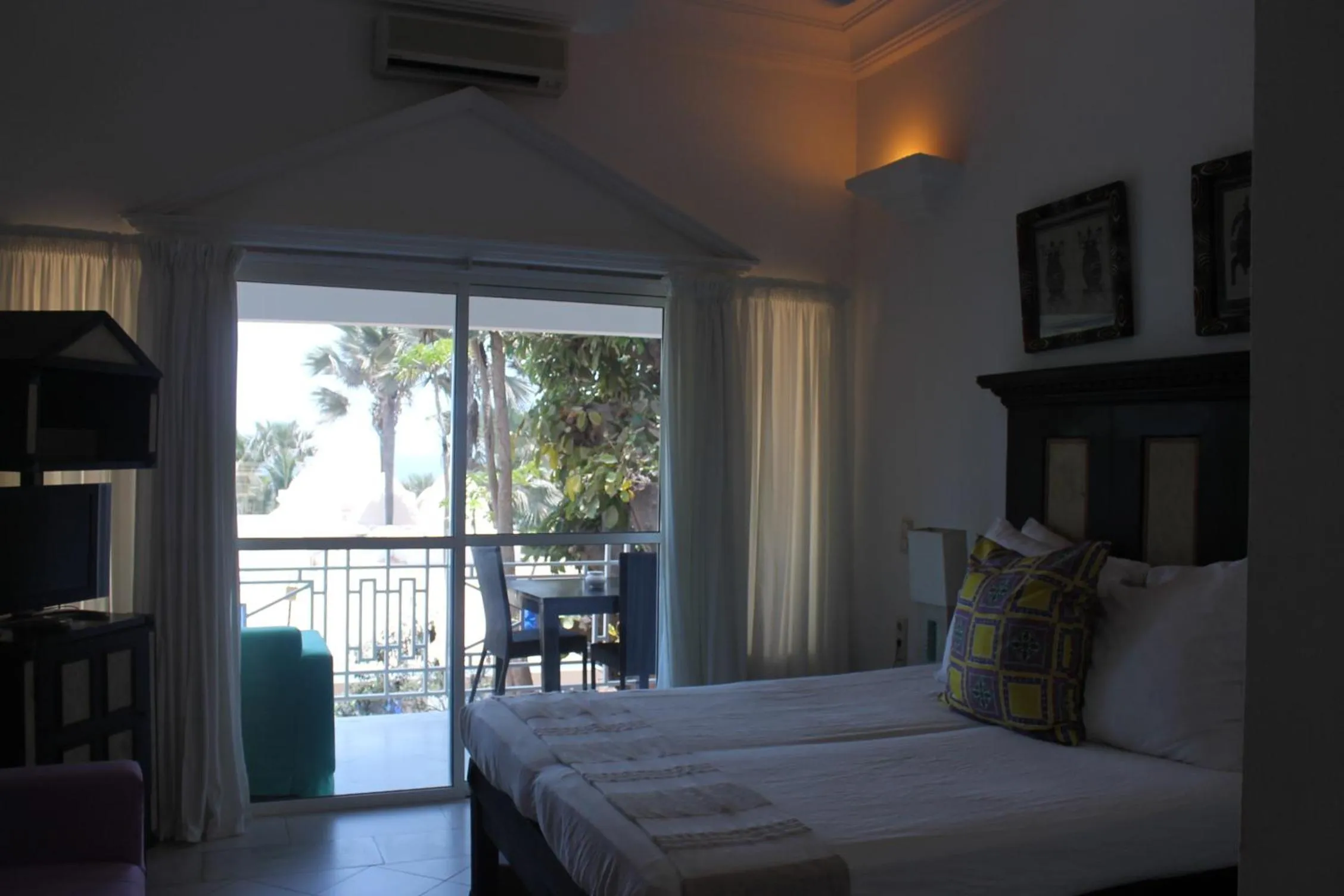 Bed in Coco Ocean Resort & Spa