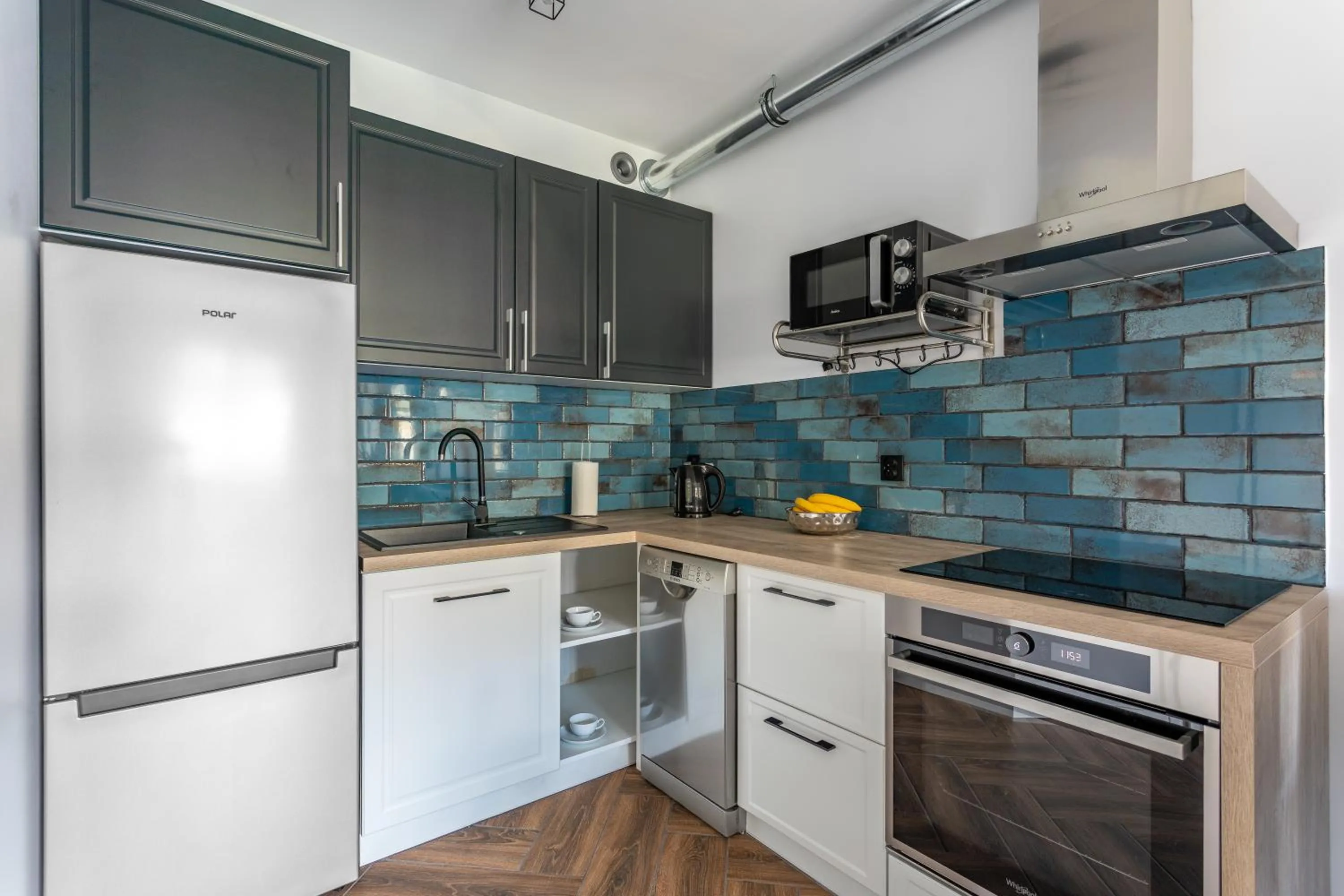 Kitchen or kitchenette in Apart-Invest Apartament Latte