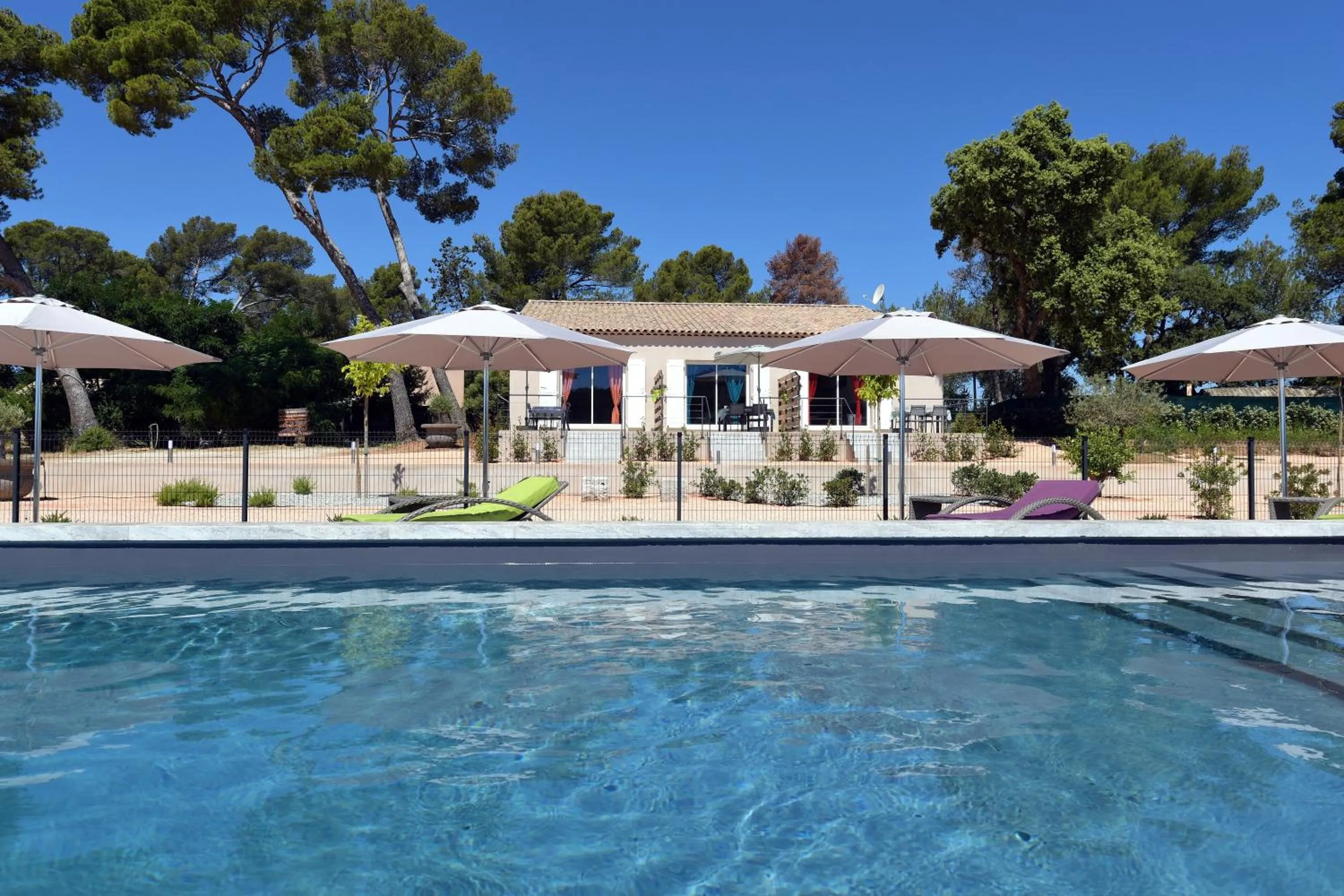Swimming pool in Sous Les Pins gîtes et chambres d'hôtes