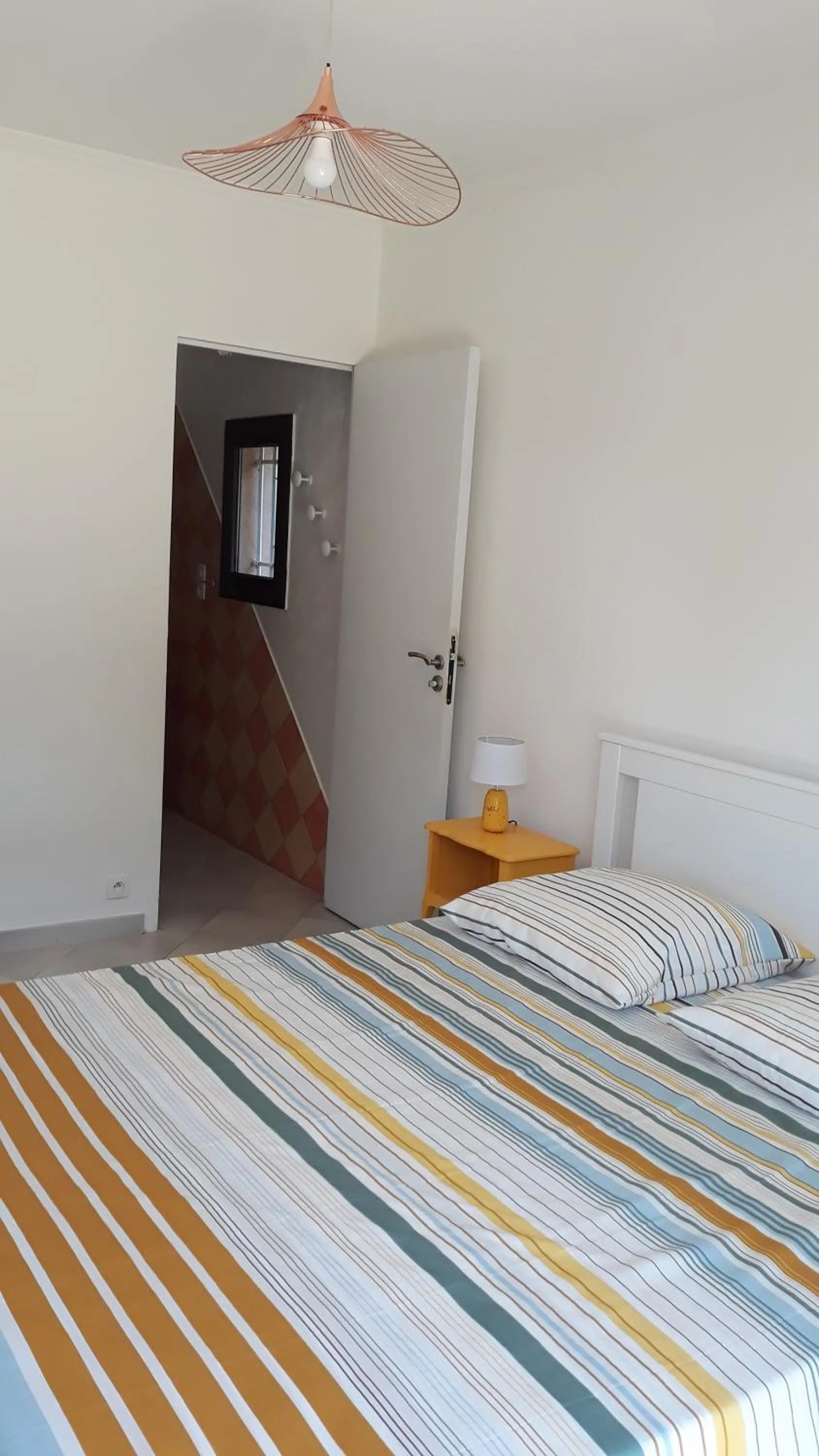 Bed in Sous Les Pins gîtes et chambres d'hôtes