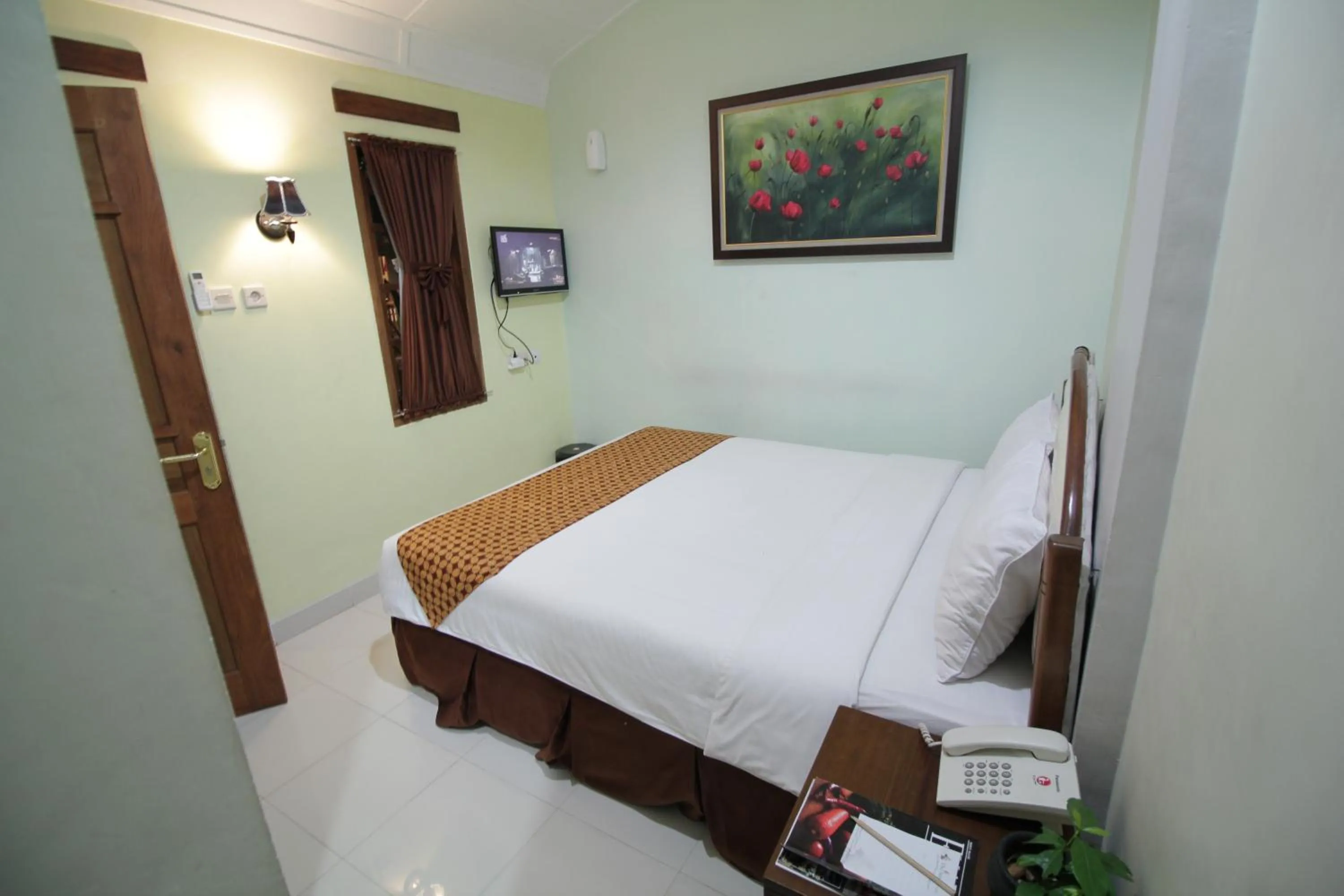Bed in The Kresna Hotel