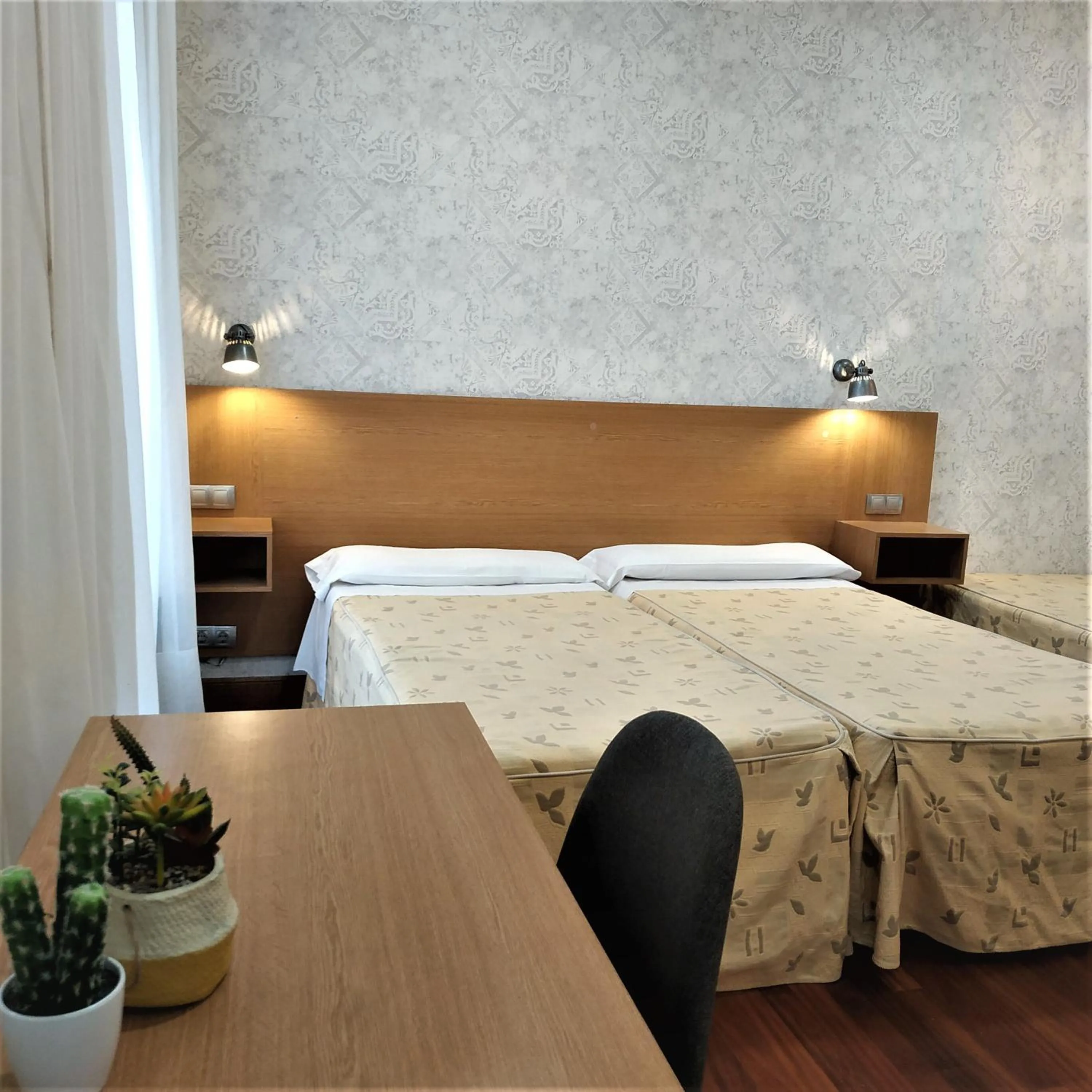 Bed in Roquefer Bilbao Central Rooms
