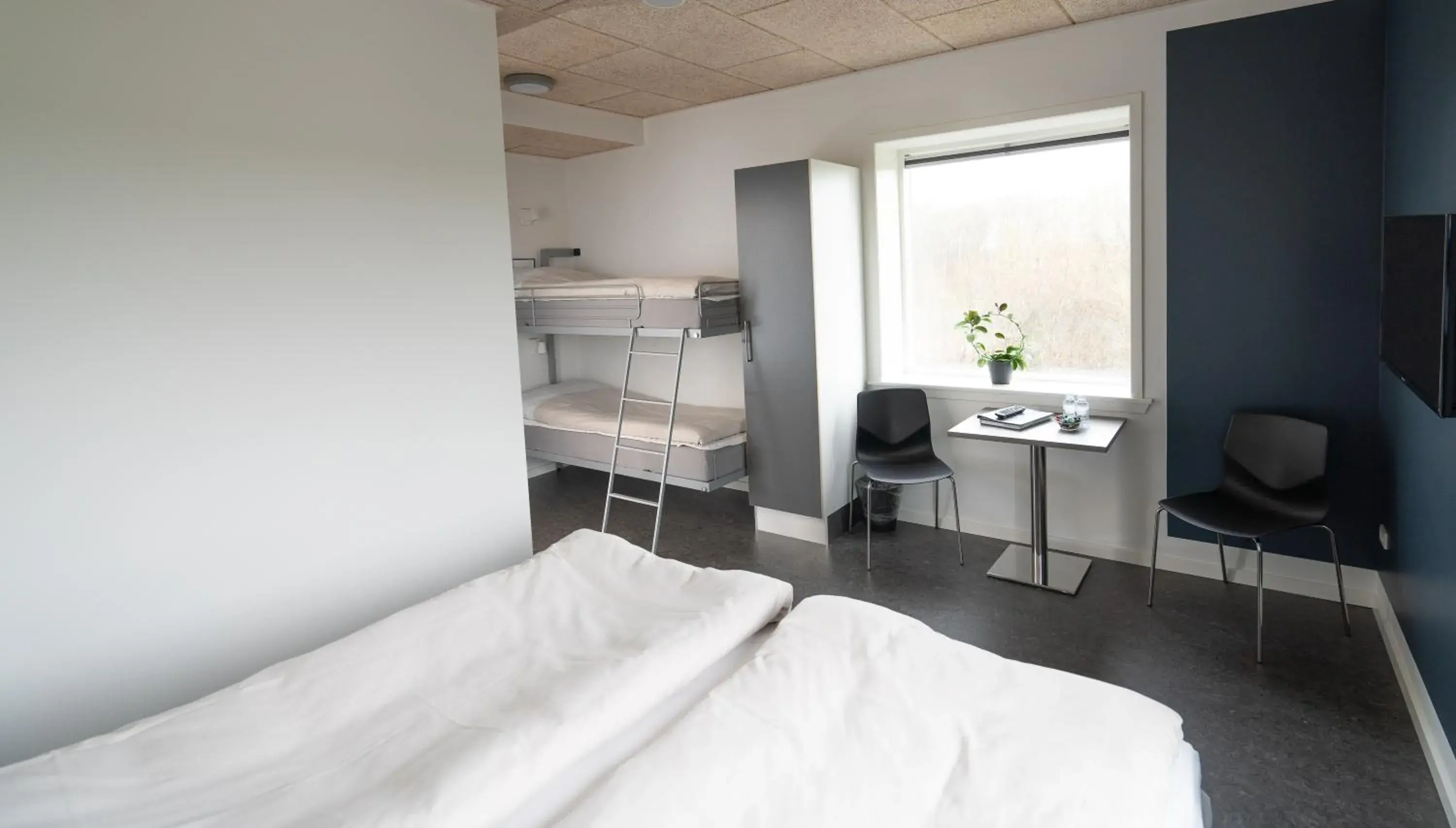Standard Quadruple Room - single occupancy in ICV SleepWell Standard Quadruple Room - single occupancy in ICV SleepWell