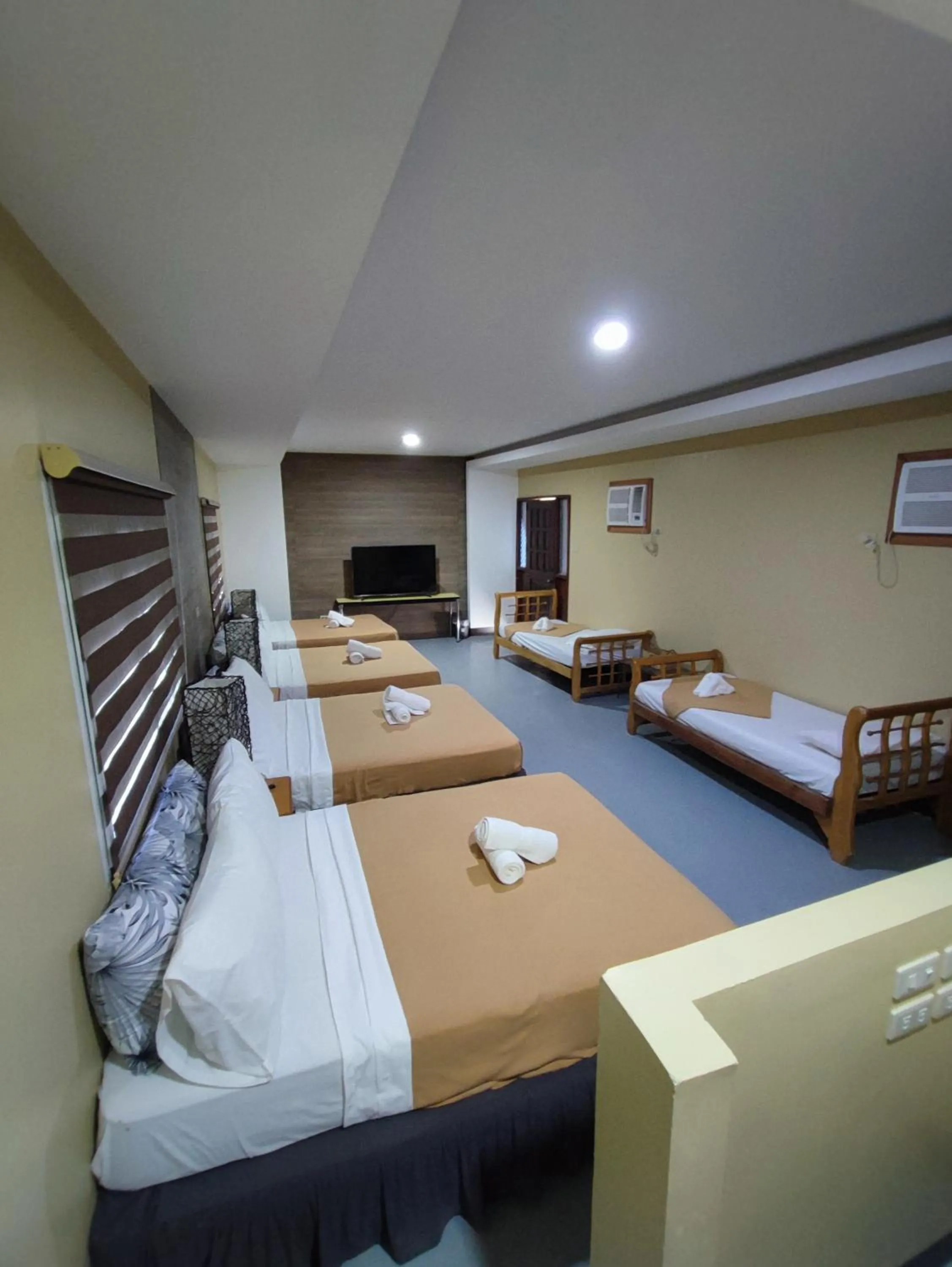 Bed in Raya Del Sol Dive Resort