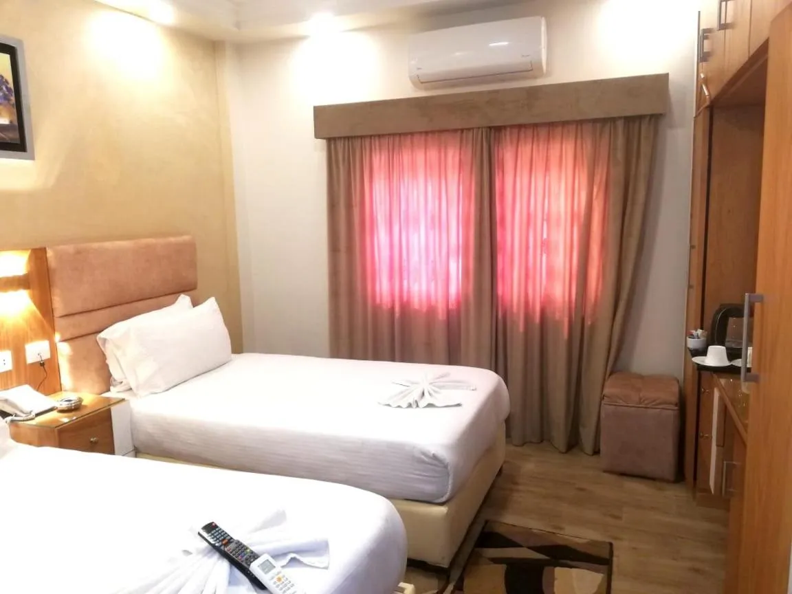 Bed in Jewel Al Nasr Hotel & Apartments