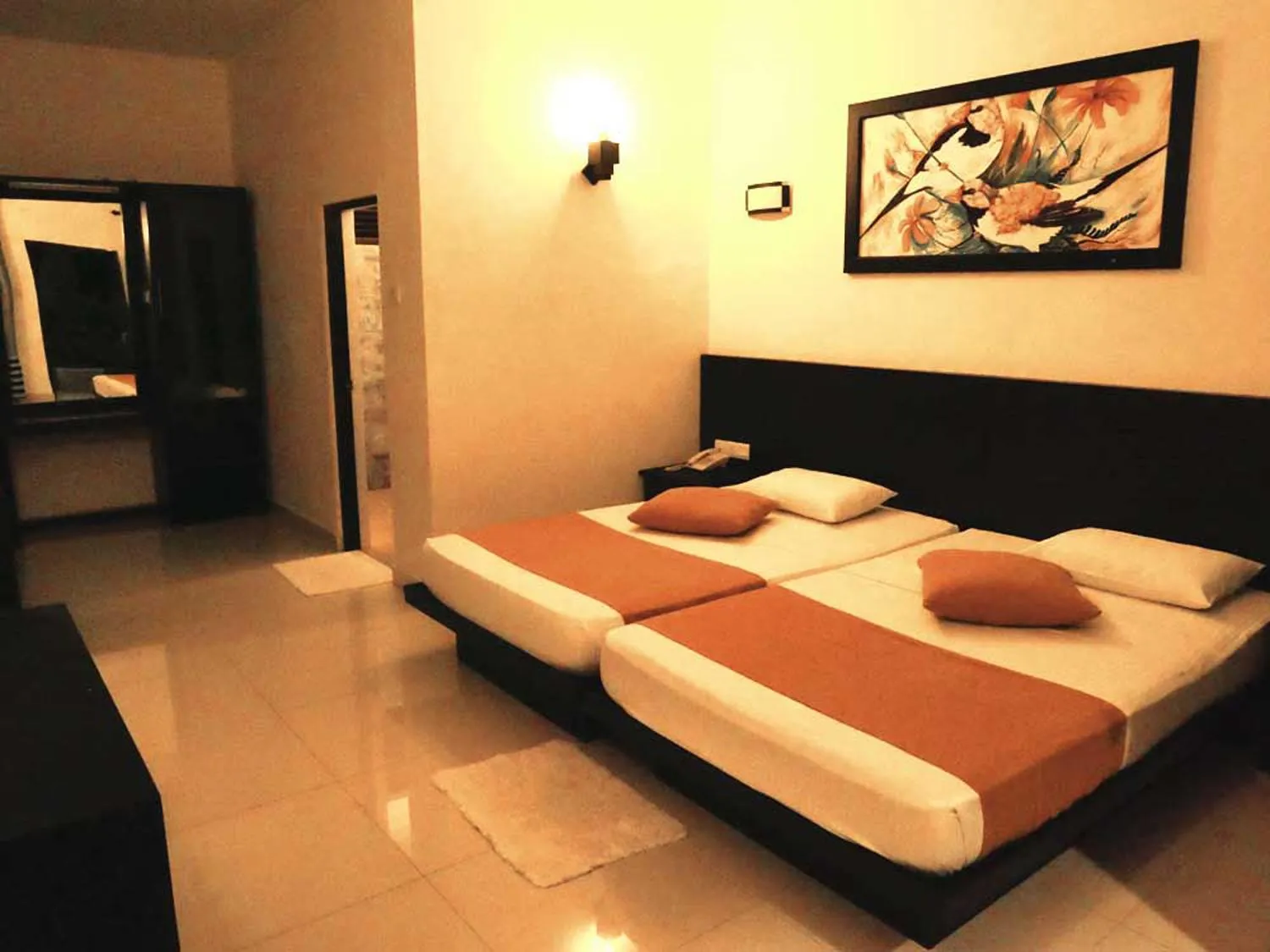 Bed in Lagoon Paradise Beach Resort