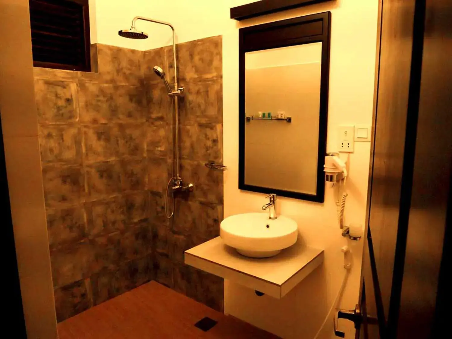 Bathroom in Lagoon Paradise Beach Resort Bathroom in Lagoon Paradise Beach Resort