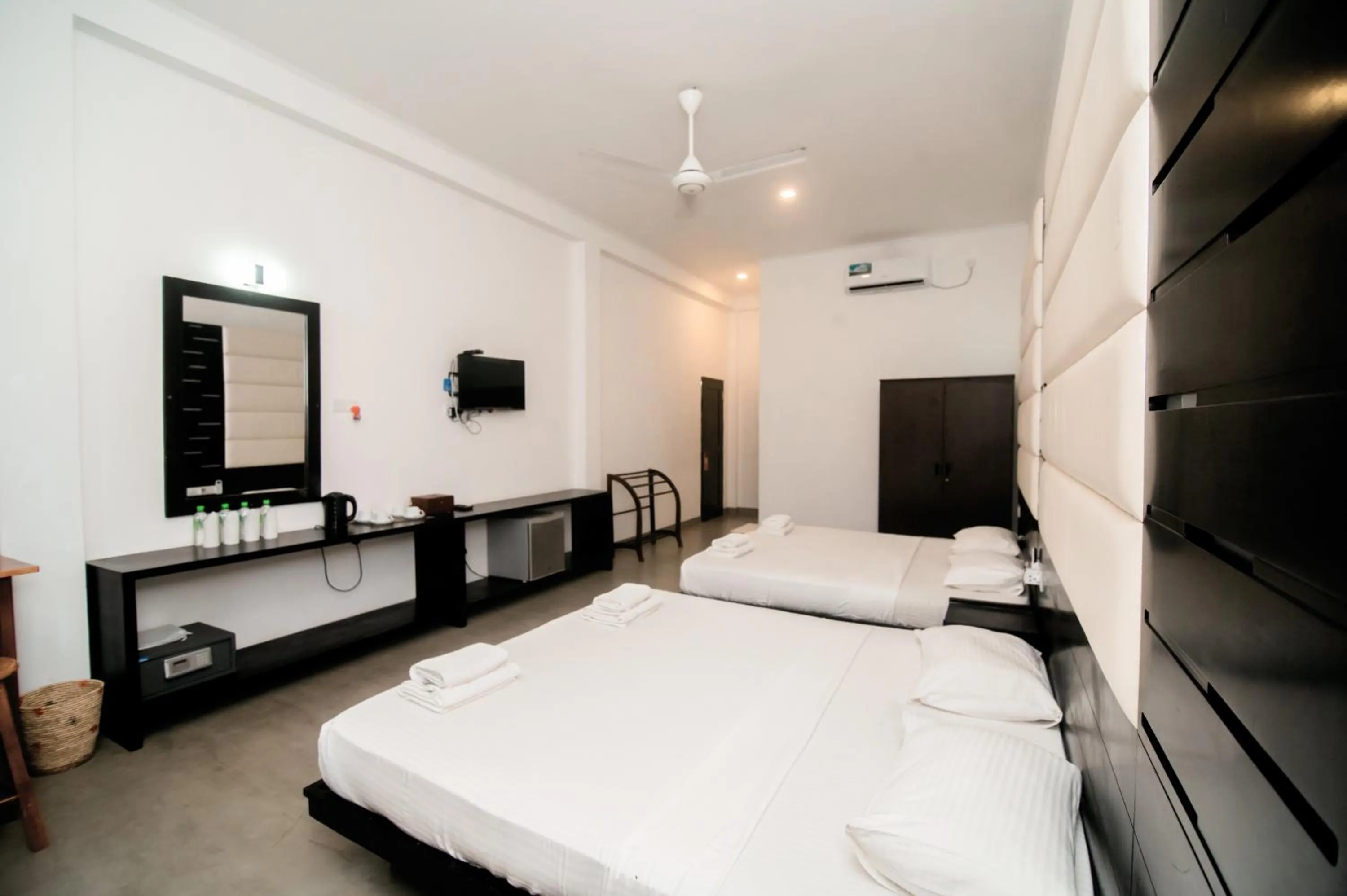 Bed in Lagoon Paradise Beach Resort