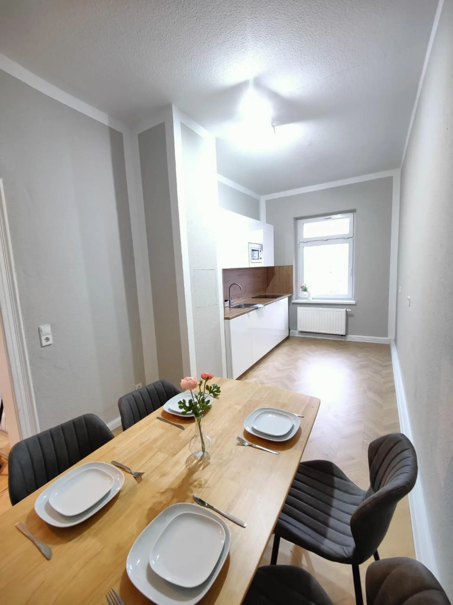 Kitchen or kitchenette in Zollikof Aparts - Sauna & Studioapartments