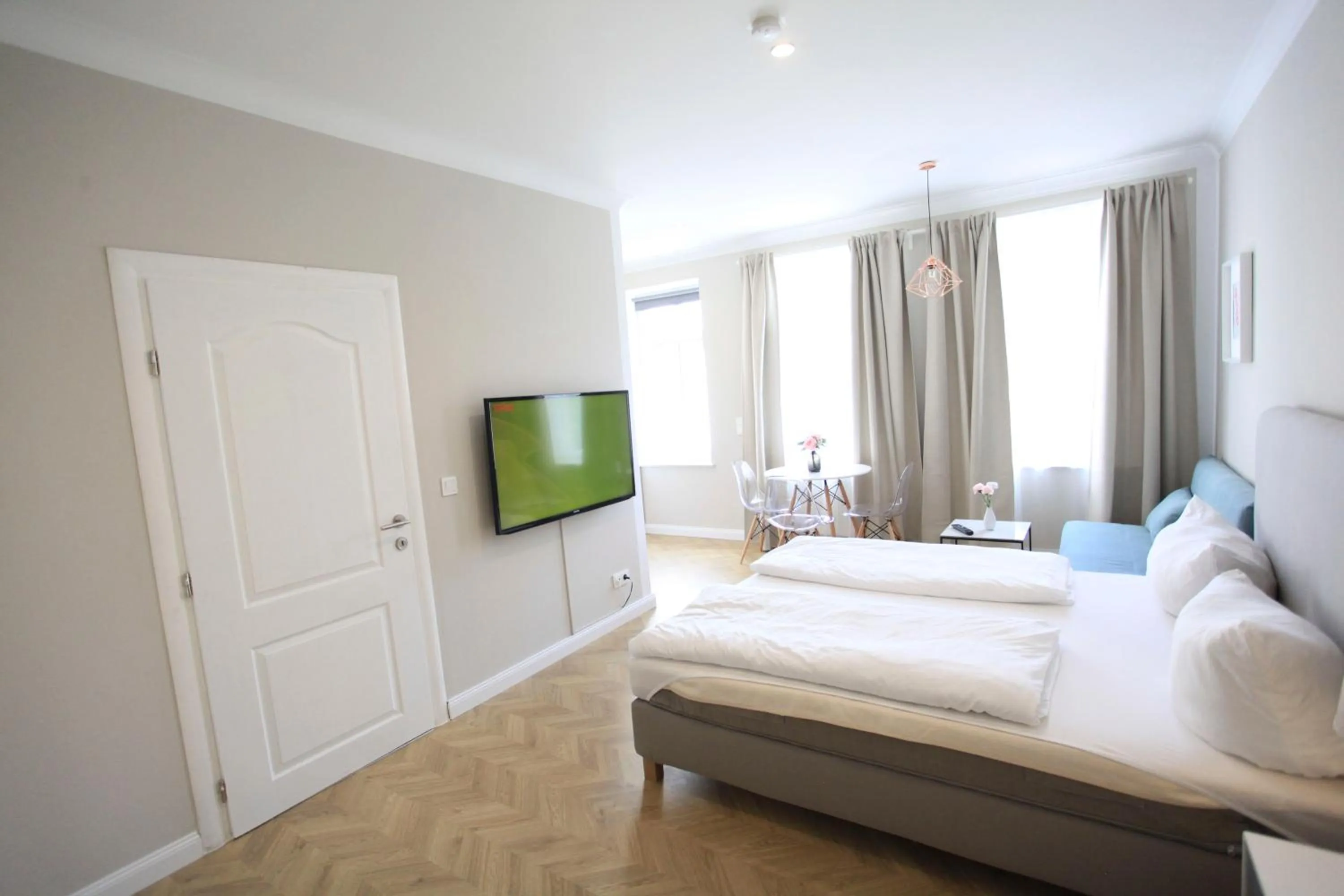 Bed in Zollikof Aparts - Sauna & Studioapartments