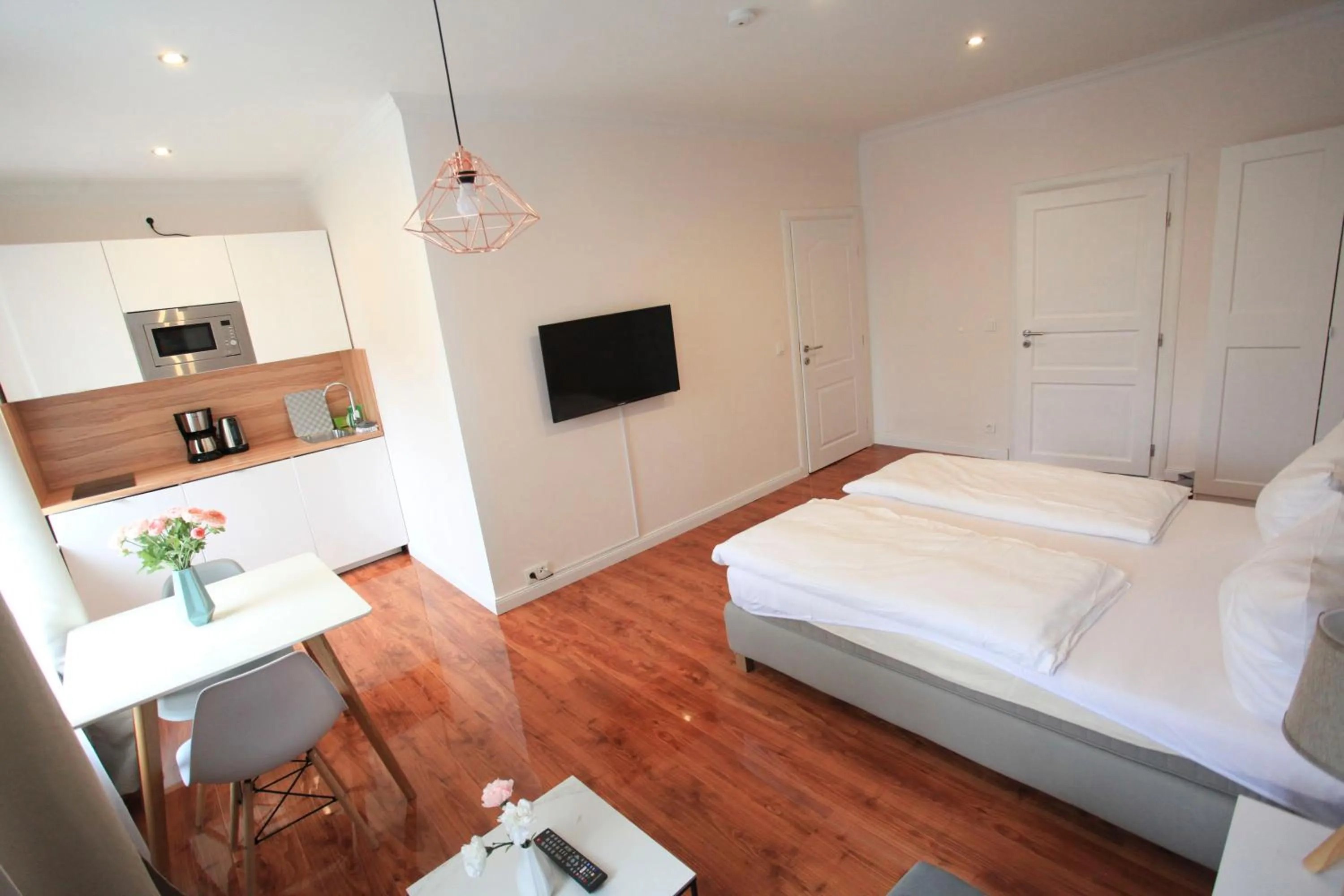 Living room, Bed in Zollikof Aparts - Sauna & Studioapartments