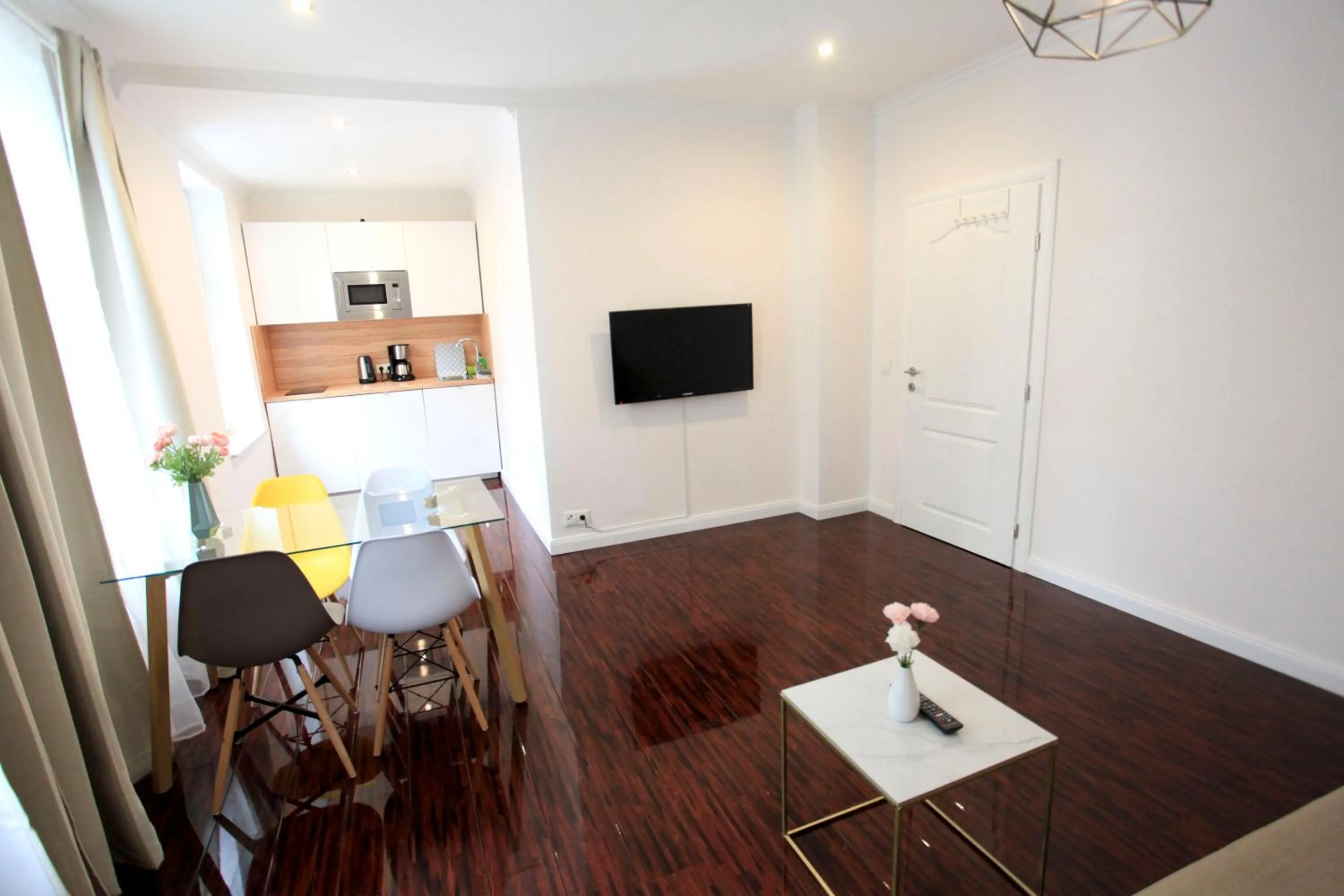 Kitchen or kitchenette in Zollikof Aparts - Sauna & Studioapartments