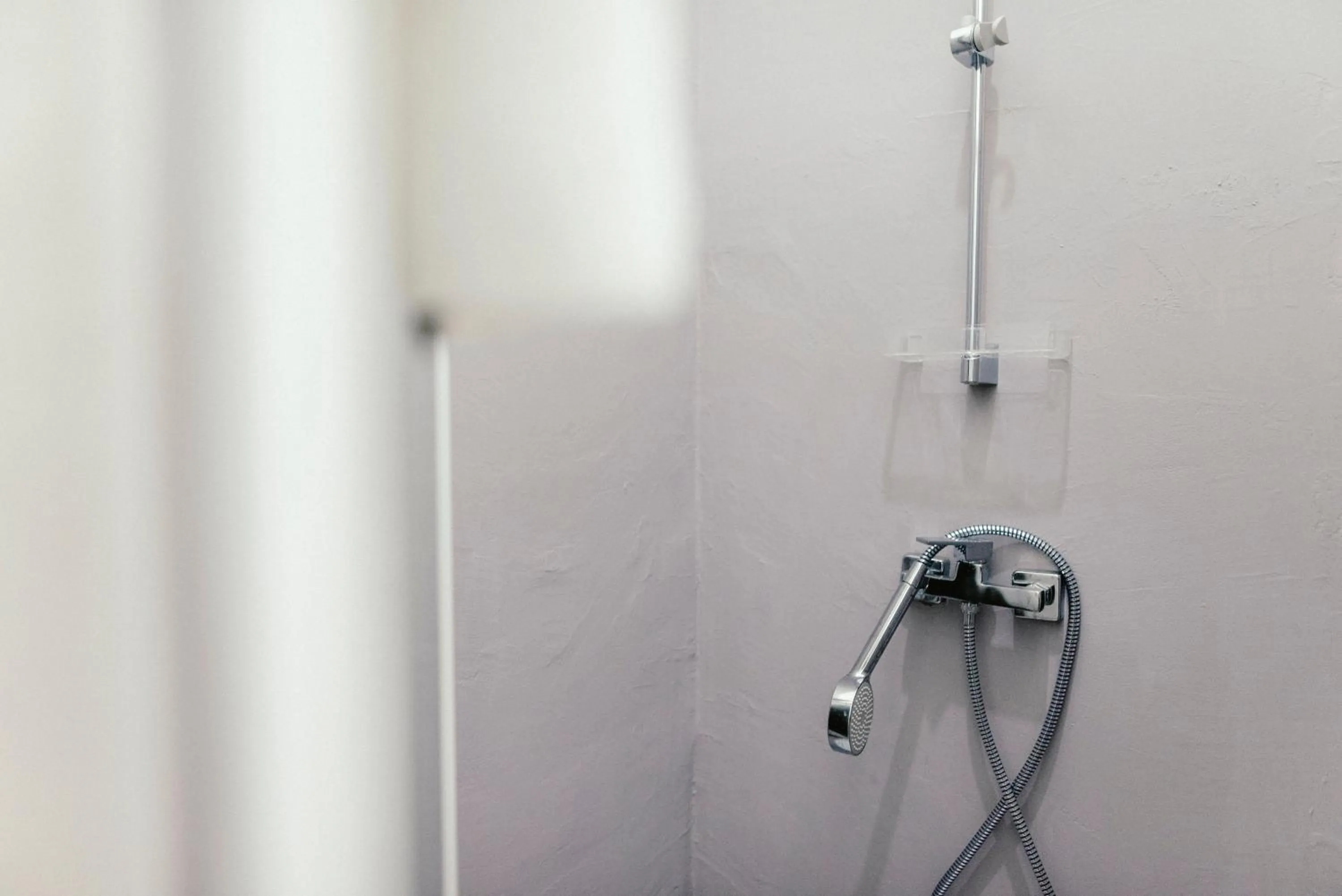 Shower in Wake Up Wellness Hostel