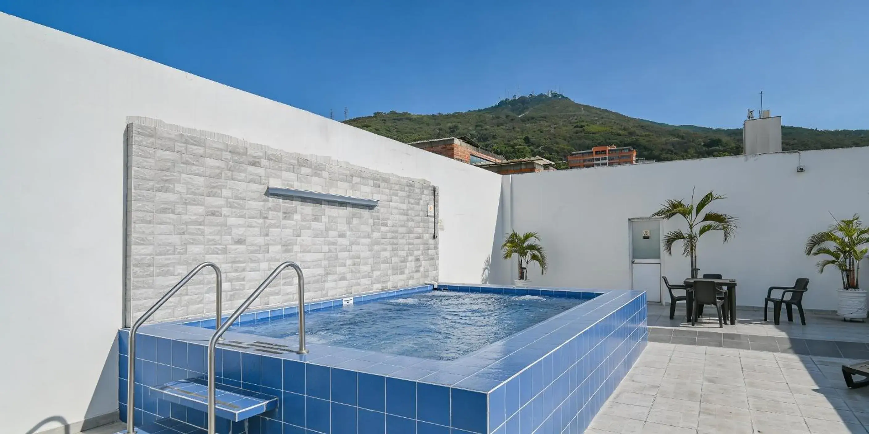 Pool view in TAMA Hotel Granada Real Cali Pool view in TAMA Hotel Granada Real Cali