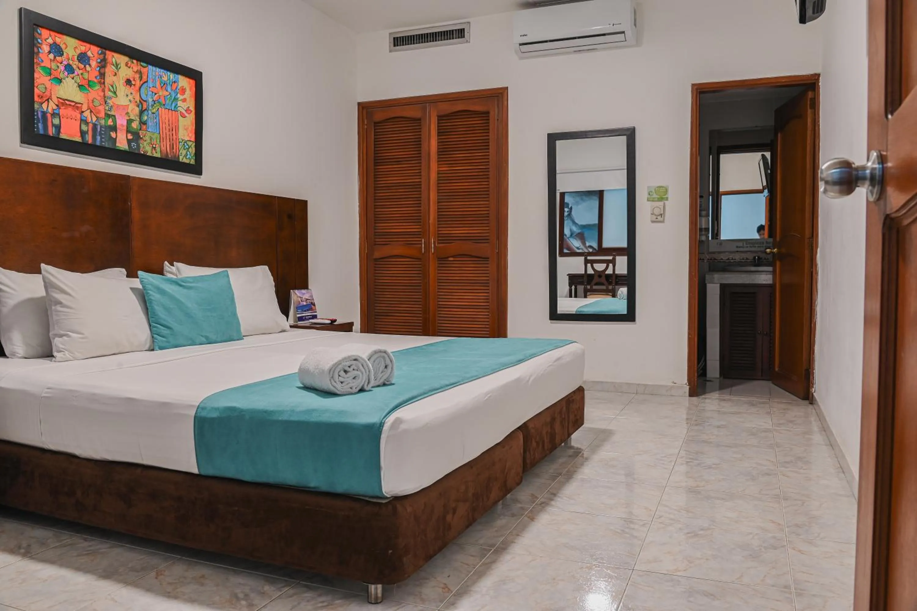 Bed in TAMA Hotel Granada Real Cali