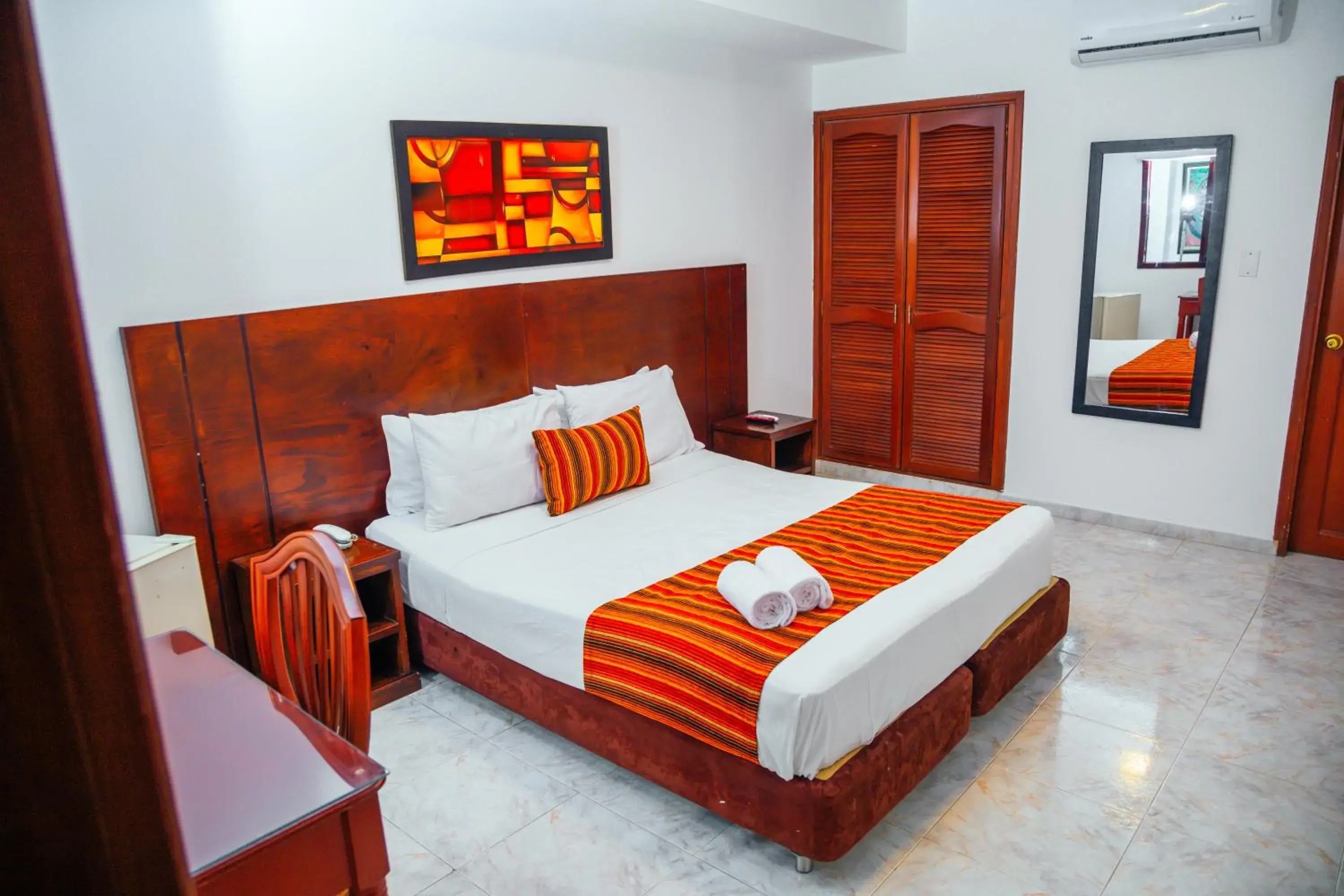 Bed in TAMA Hotel Granada Real Cali Bed in TAMA Hotel Granada Real Cali