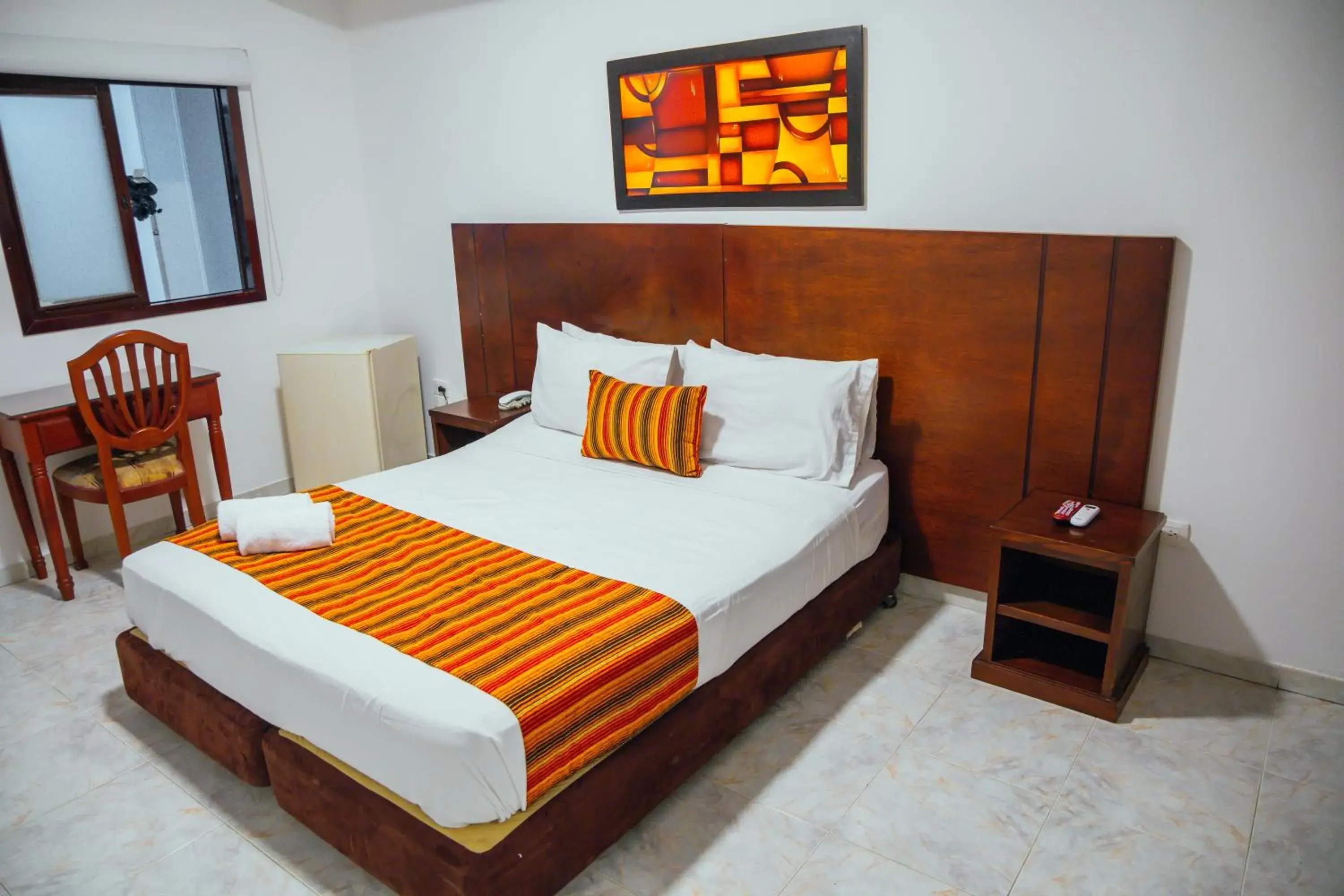 Bed in TAMA Hotel Granada Real Cali Bed in TAMA Hotel Granada Real Cali