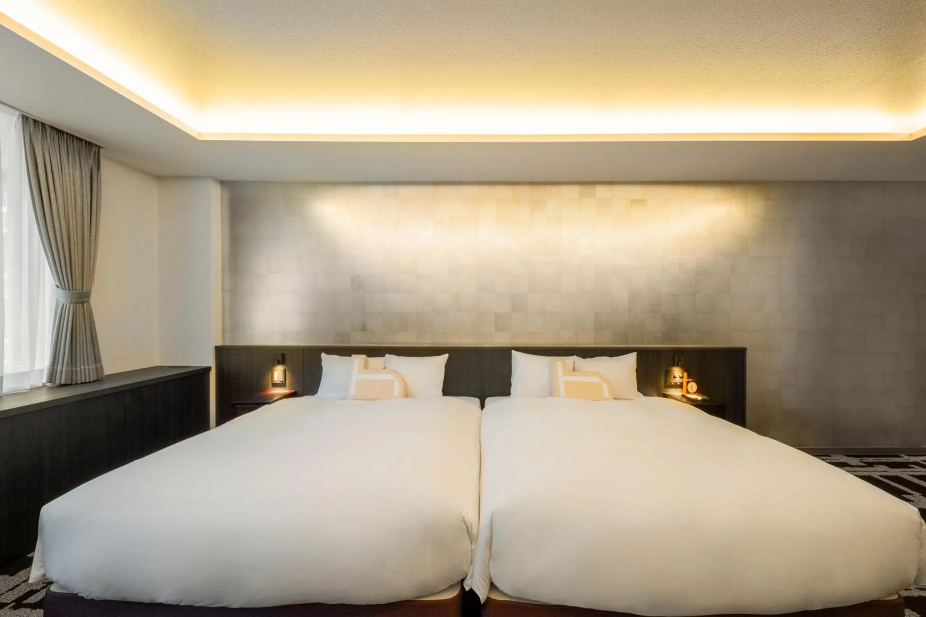 Bed in Homm Stay Nagi Sanjo Kyoto By Banyan Group