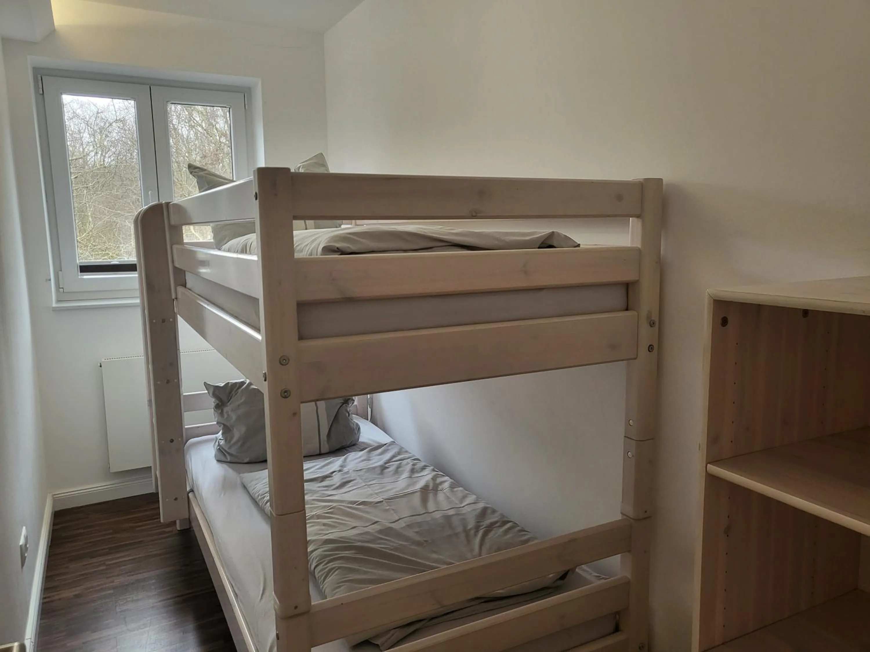 Bed in Ferienwohnung "Im Bad 40a - Wohnung 4"