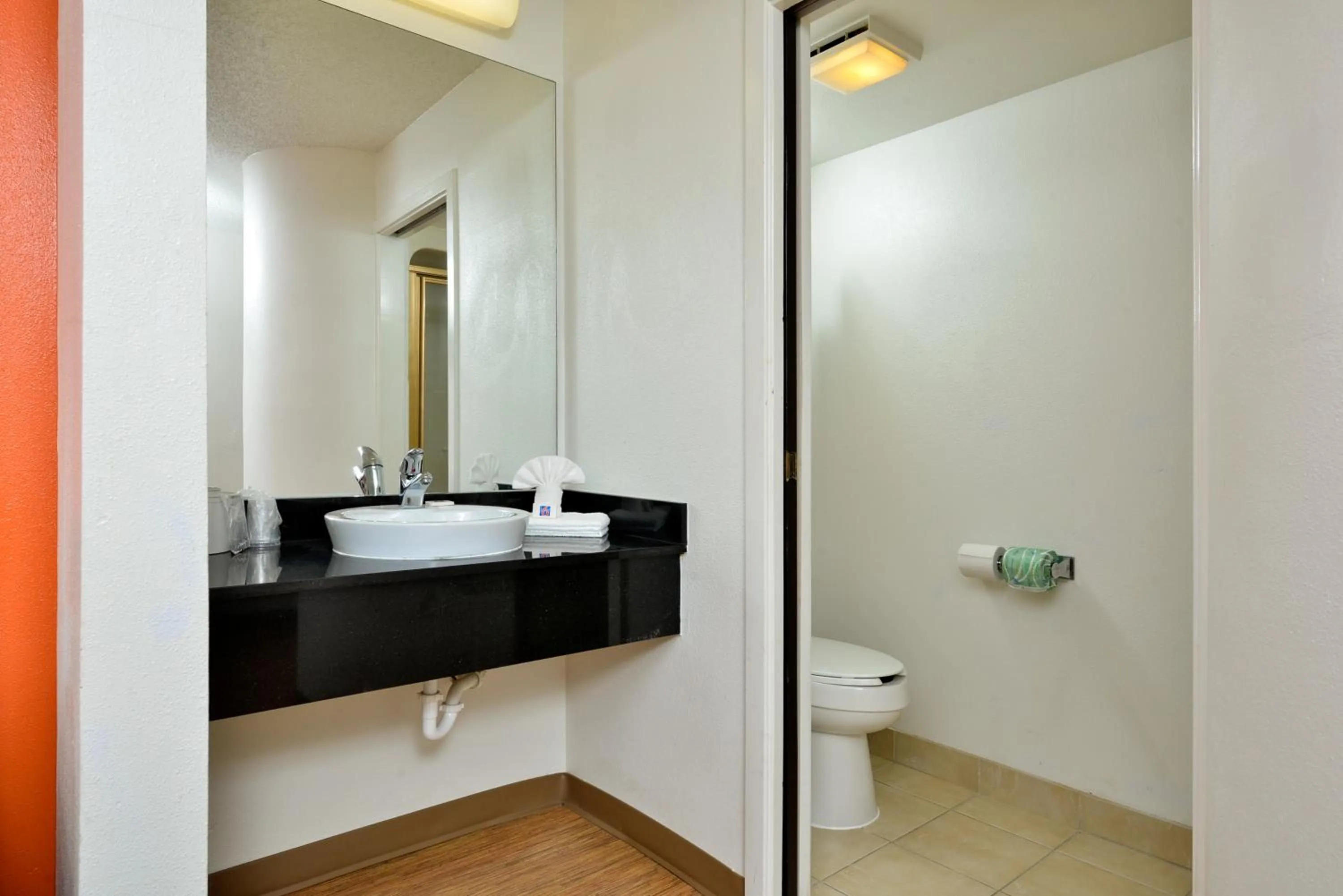 Toilet in Motel 6-Plano, TX - West - Frisco