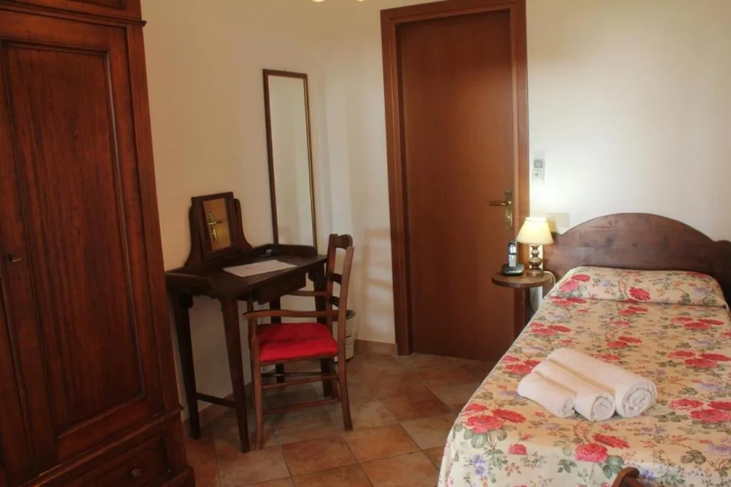 Seating area, Bed in Hotel Residence I Briganti di Capalbio