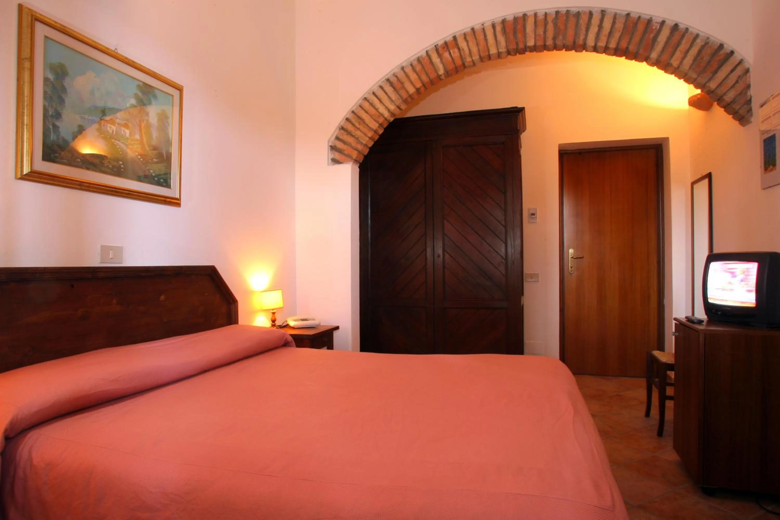 Decorative detail, Bed in Hotel Residence I Briganti di Capalbio