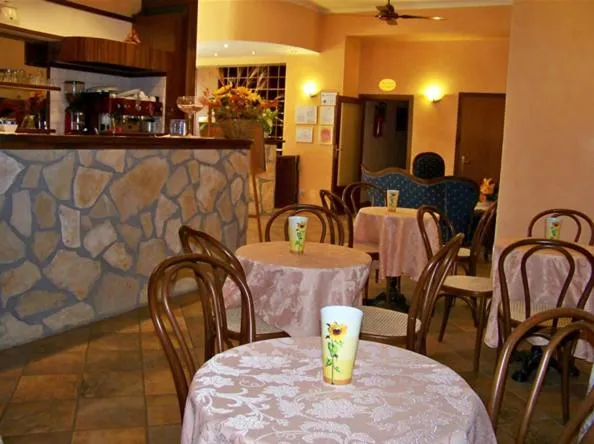 Communal lounge/ TV room in Hotel Residence I Briganti di Capalbio