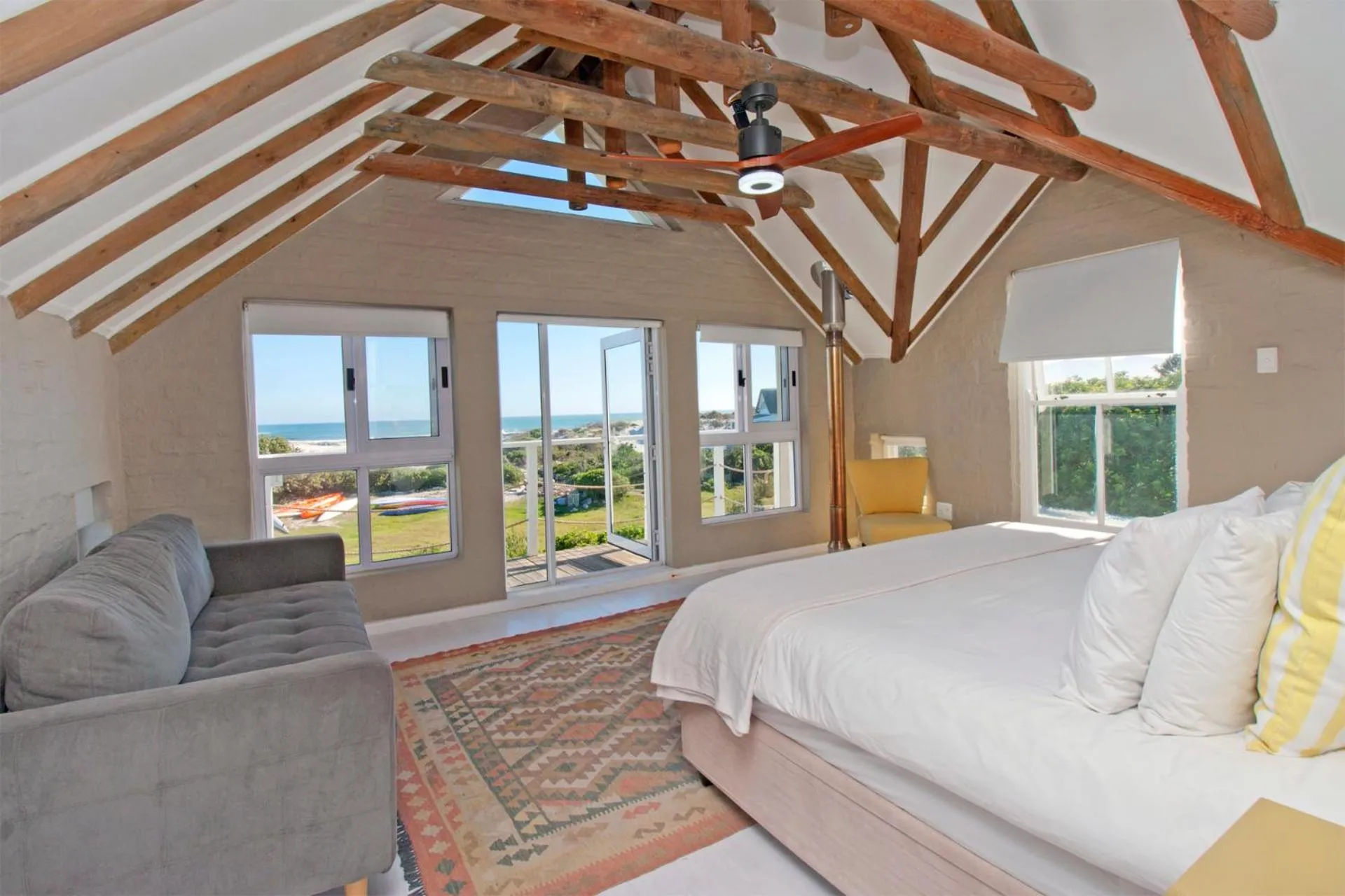 Seating area, Bed in Fin Whale Beach House