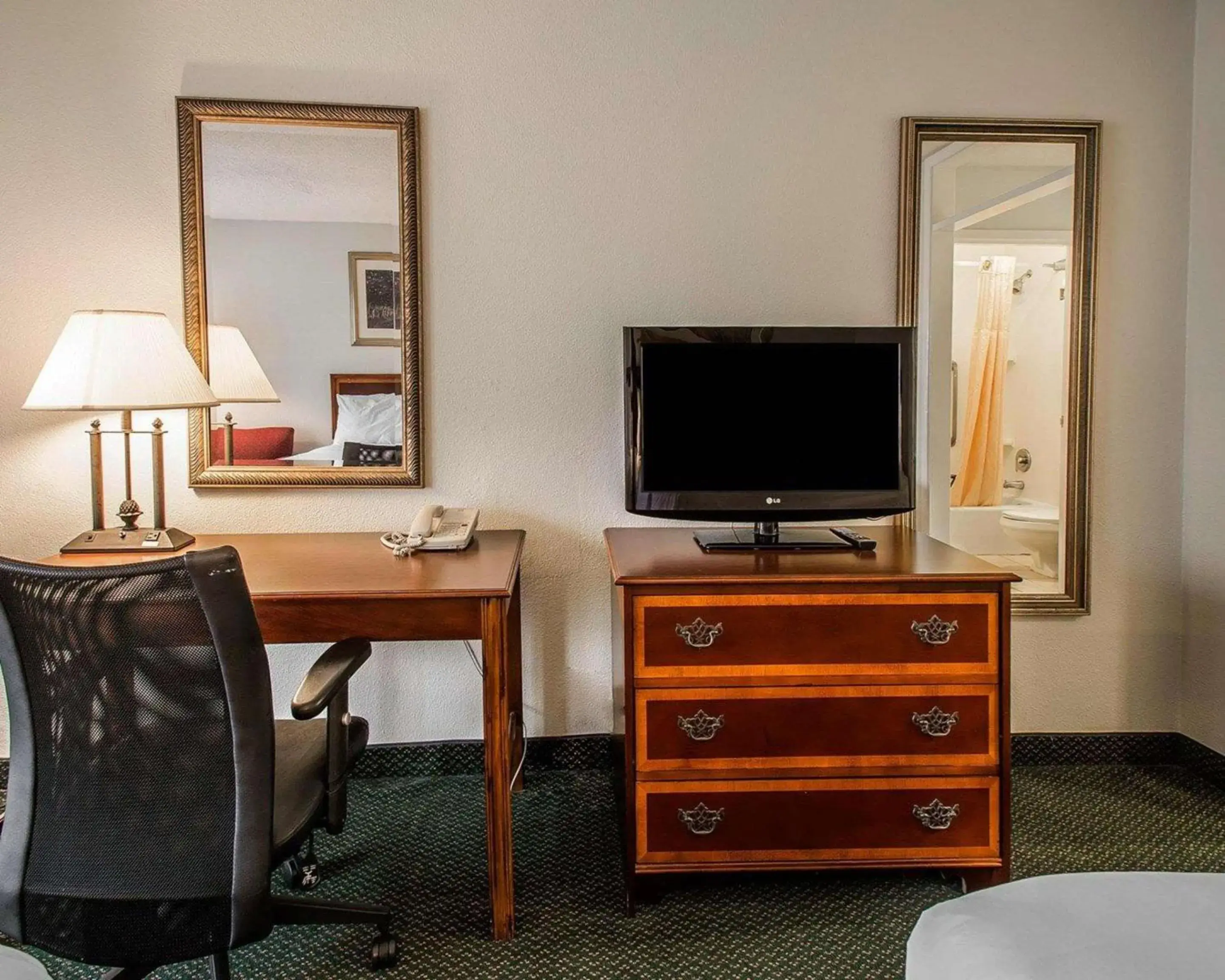 Photo of the whole room, TV/Entertainment Center in Clarion Inn & Suites Dothan South