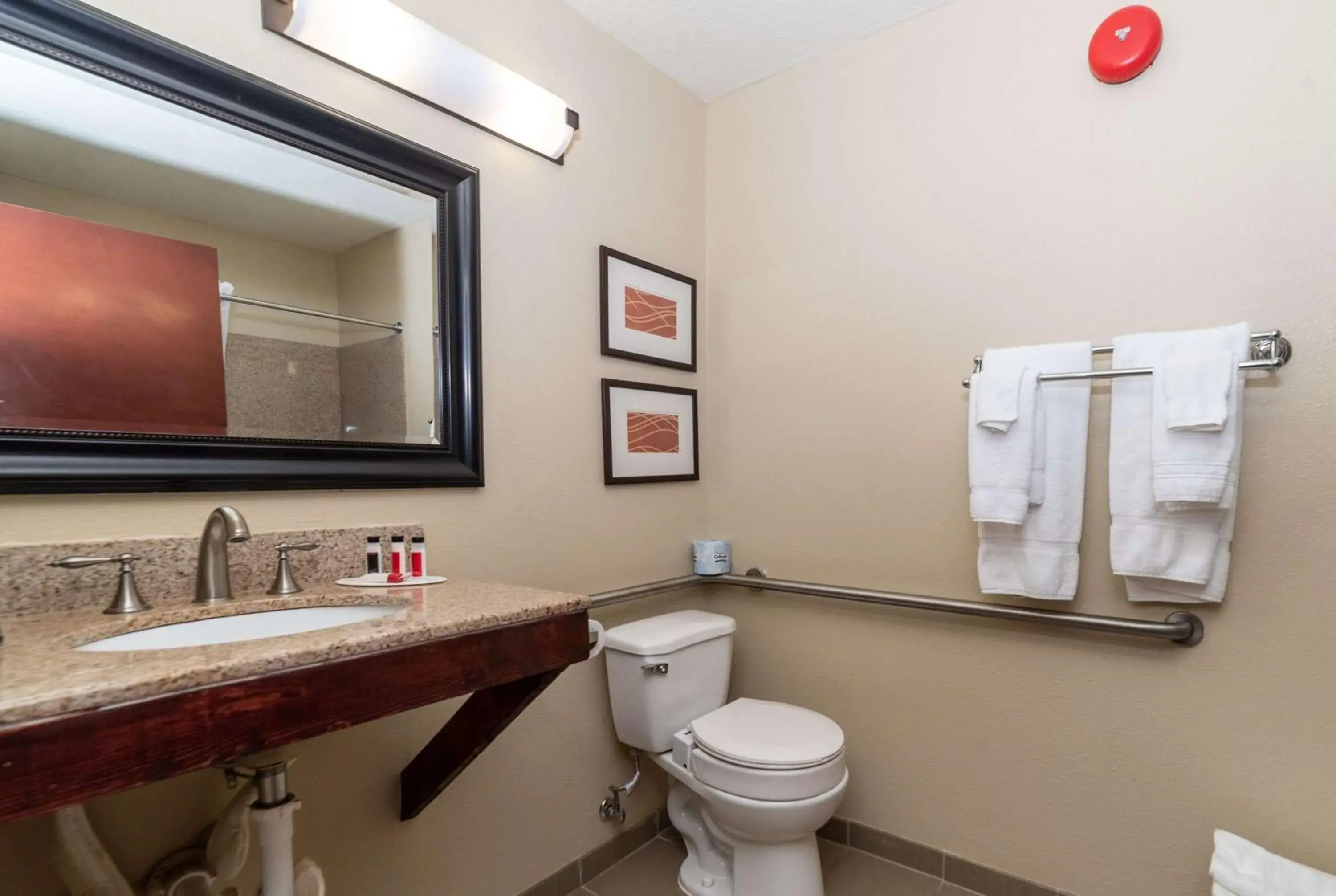 Bathroom in Baymont by Wyndham Caddo Valley/Arkadelphia Bathroom in Baymont by Wyndham Caddo Valley/Arkadelphia