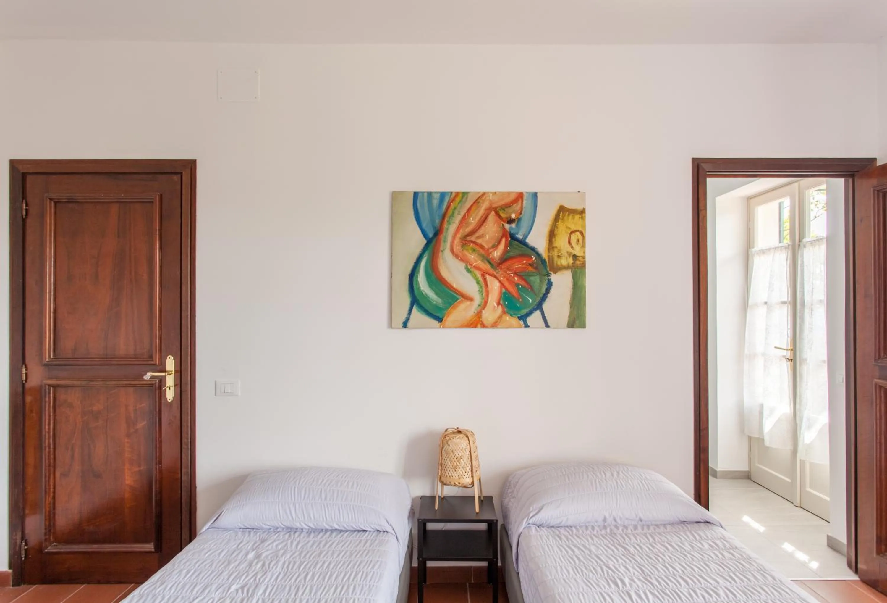 Photo of the whole room in AMERICA NEI BOSCHI B&B