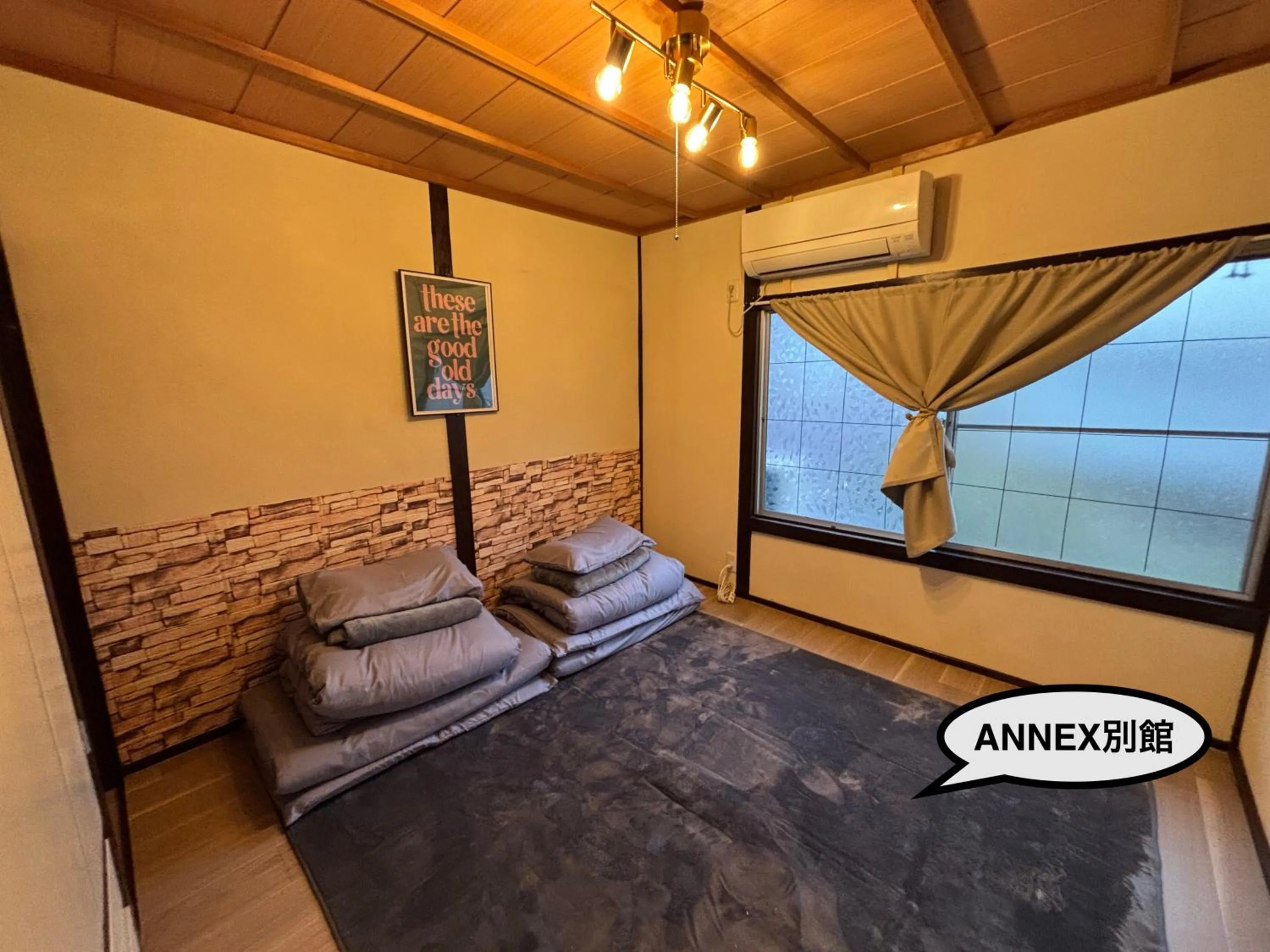 Bed in 777 Takamatsu Guest House