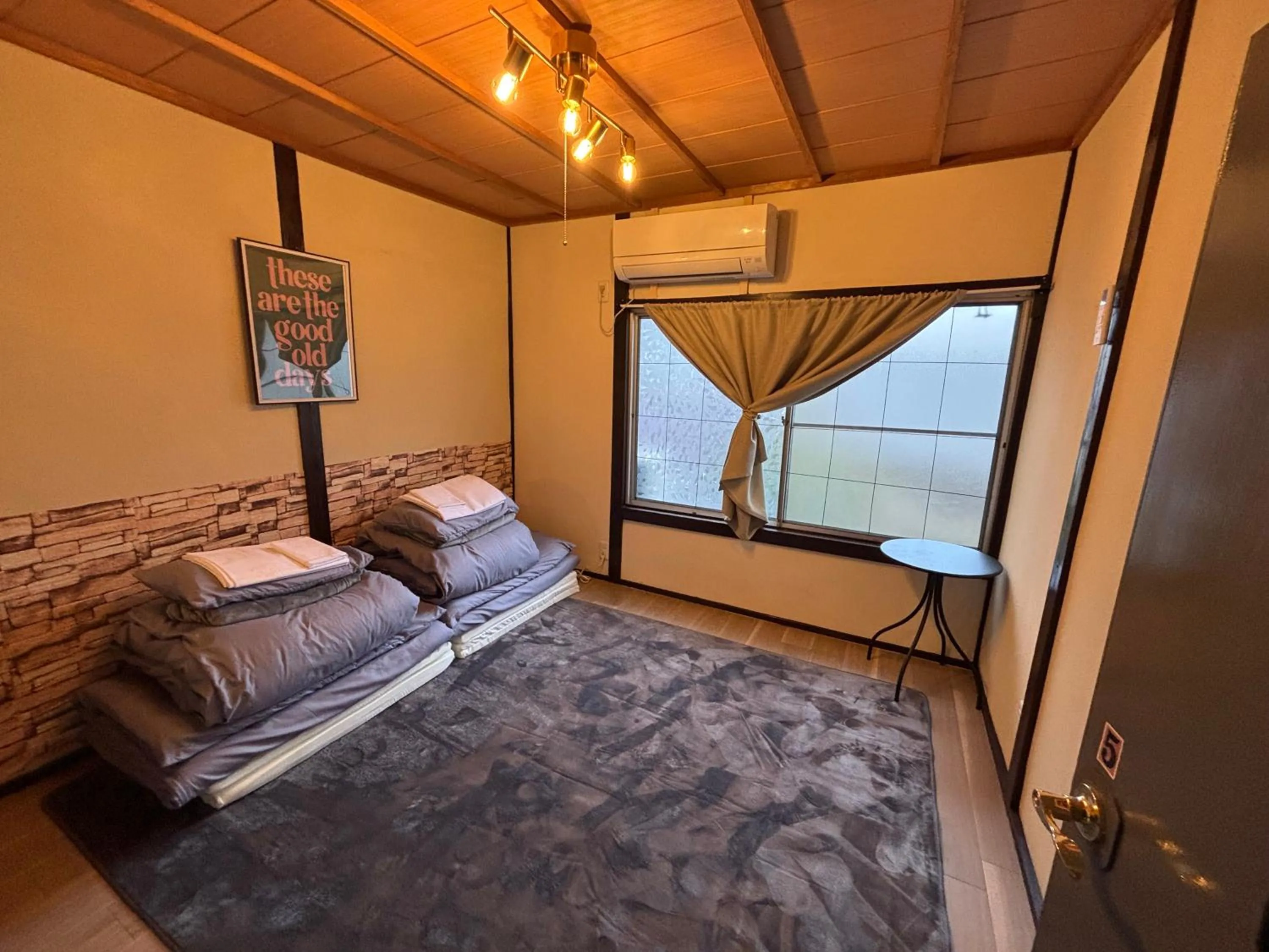 Photo of the whole room, Bed in 777 Takamatsu Guest House