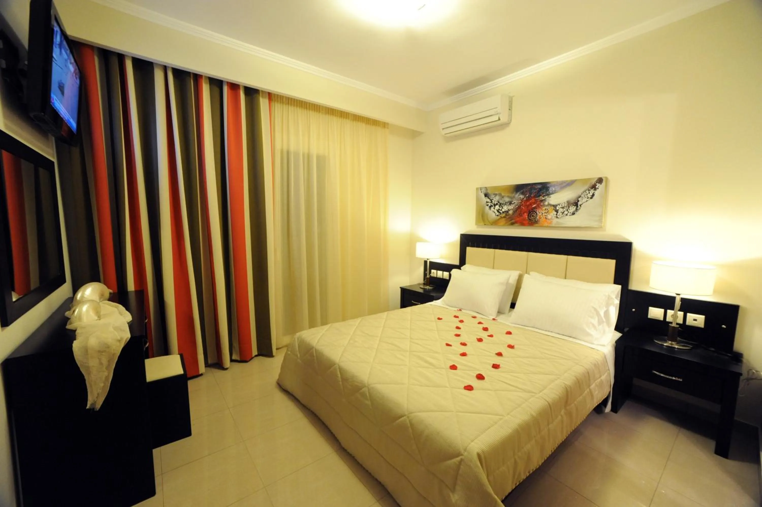 Bed in Mamfredas Luxury Resort