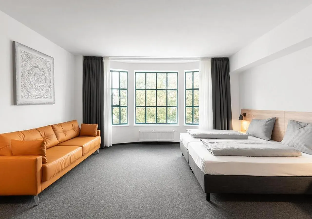 Photo of the whole room, Bed in Apartimo Landshut Photo of the whole room, Bed in Apartimo Landshut