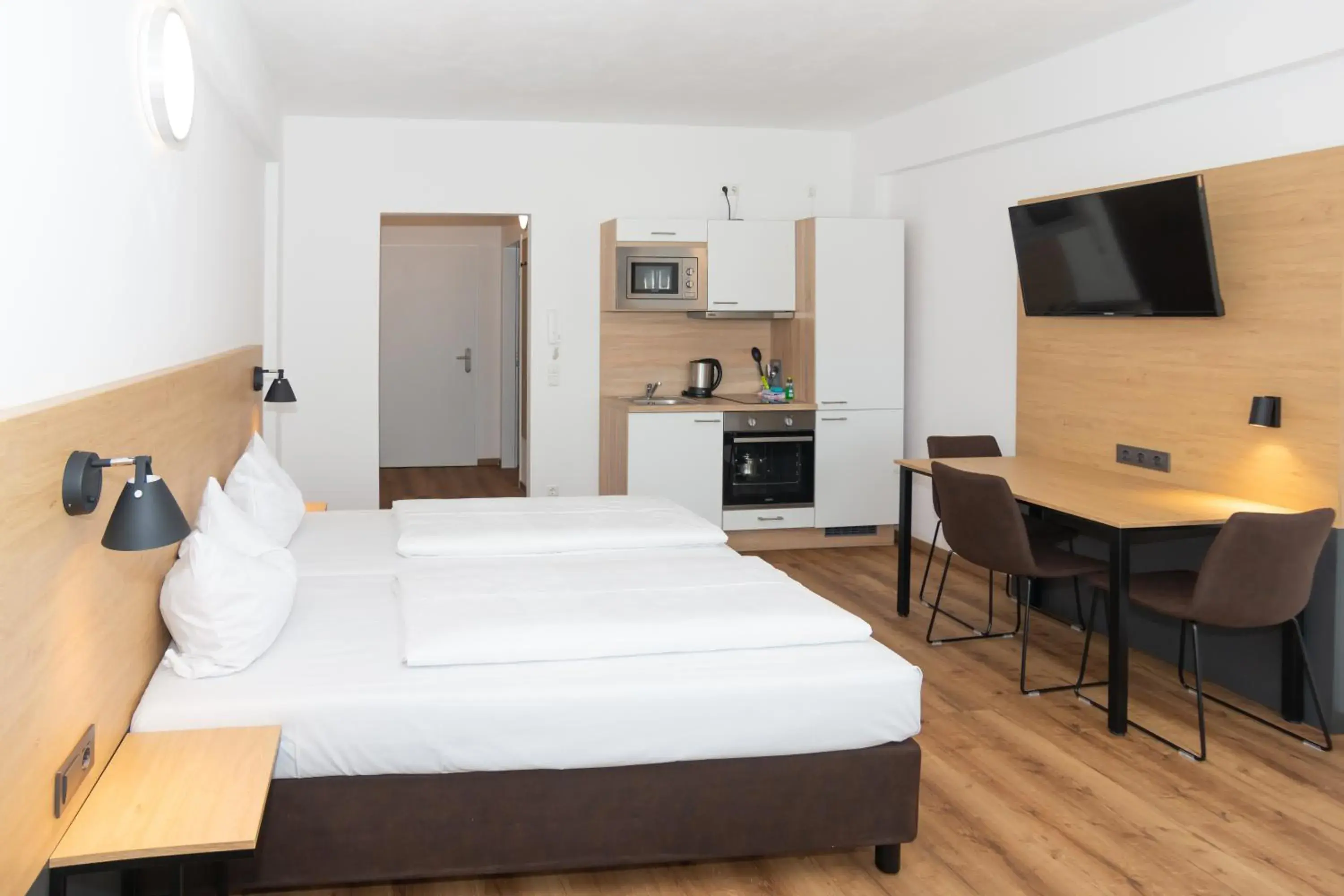 Photo of the whole room, Bed in Apartimo Landshut Photo of the whole room, Bed in Apartimo Landshut