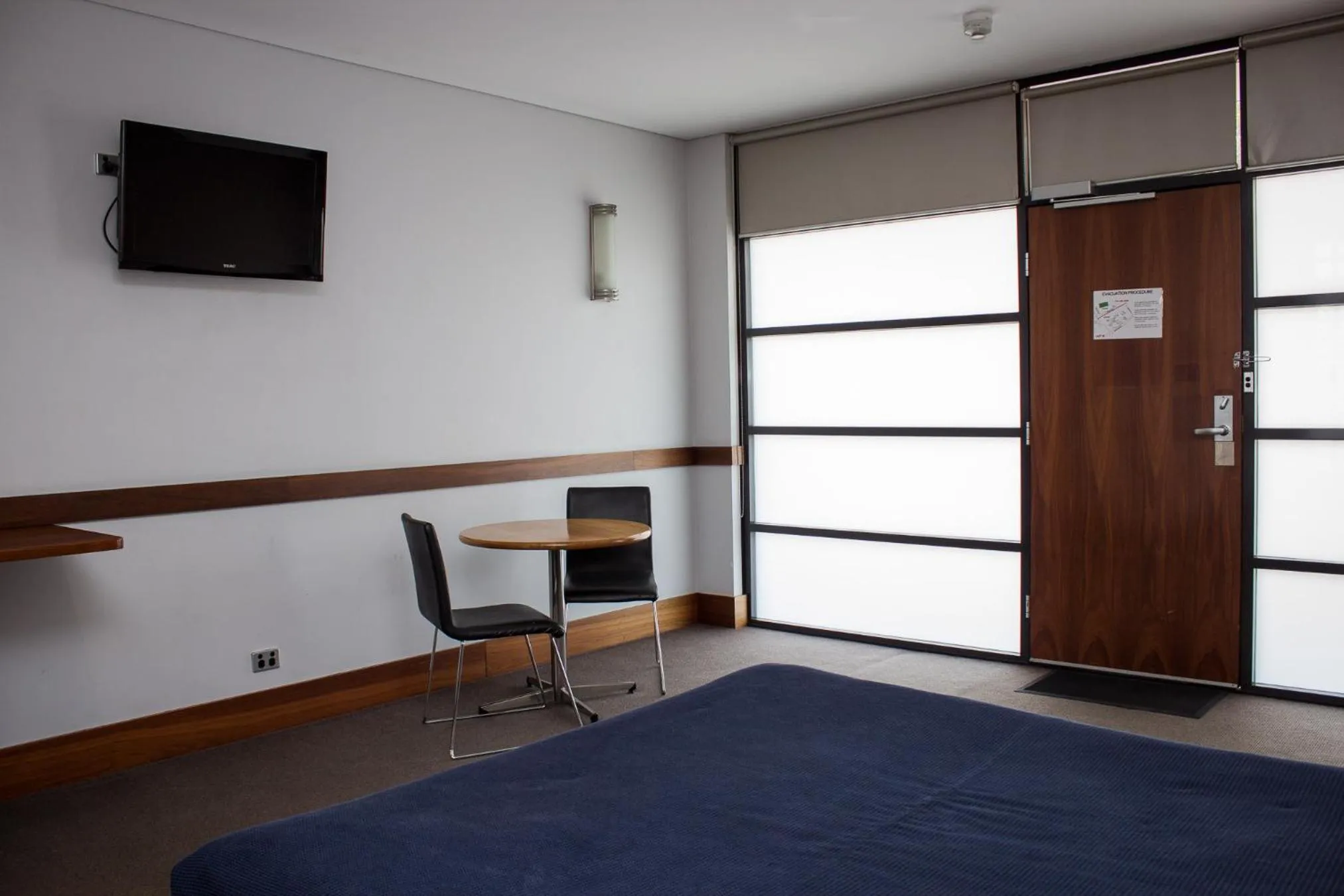 Bed in Highlander Hotel Bar Kitchen Rooftop