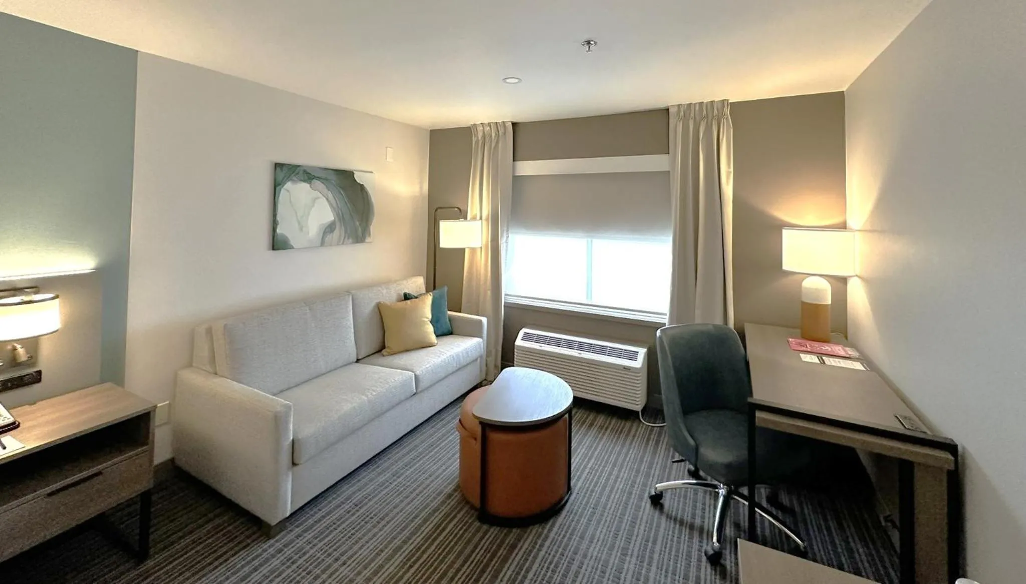 Living room, Bed in Comfort Suites at Tucson Mall