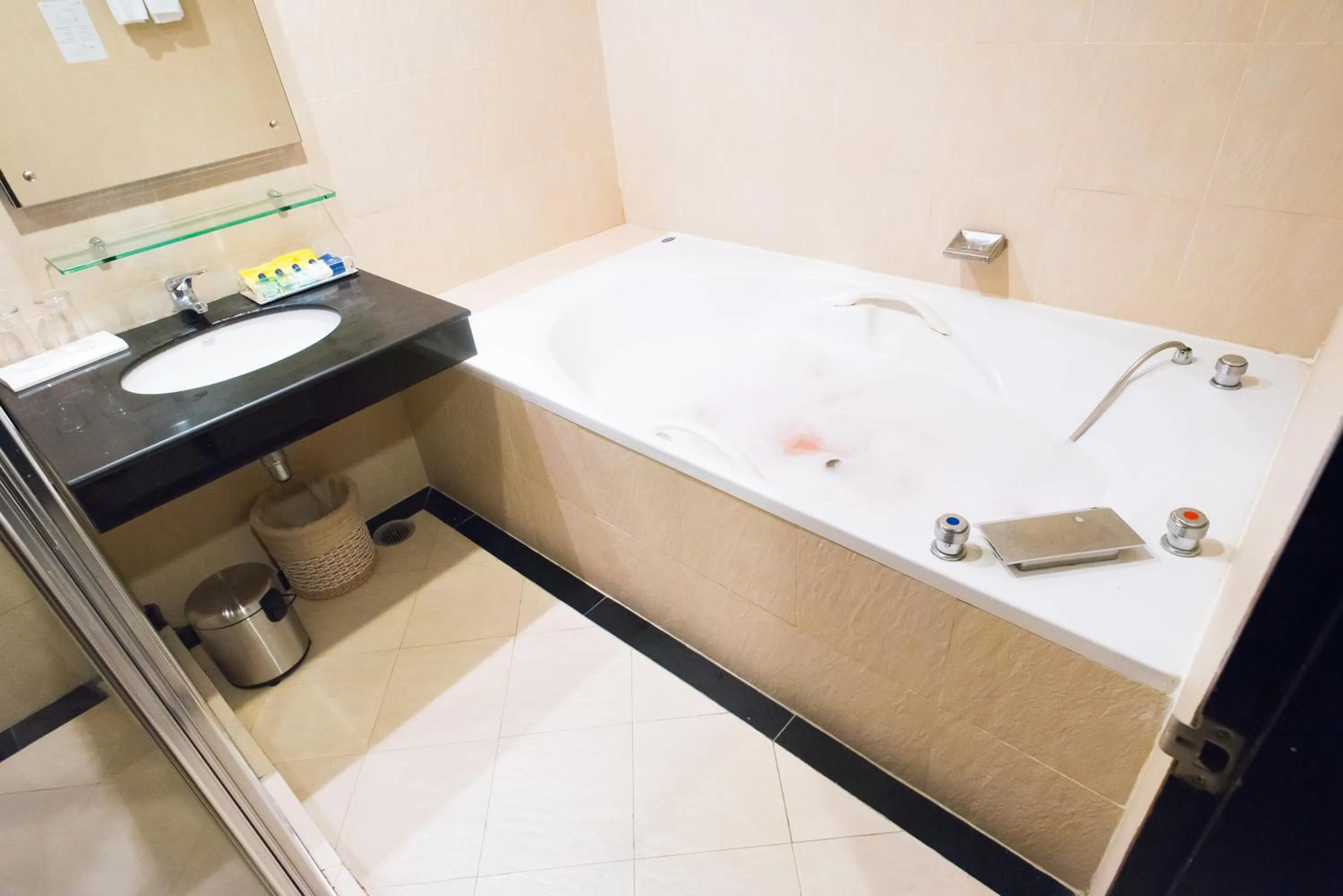 Bathroom in Intimate Hotel Pattaya - SHA Extra Plus