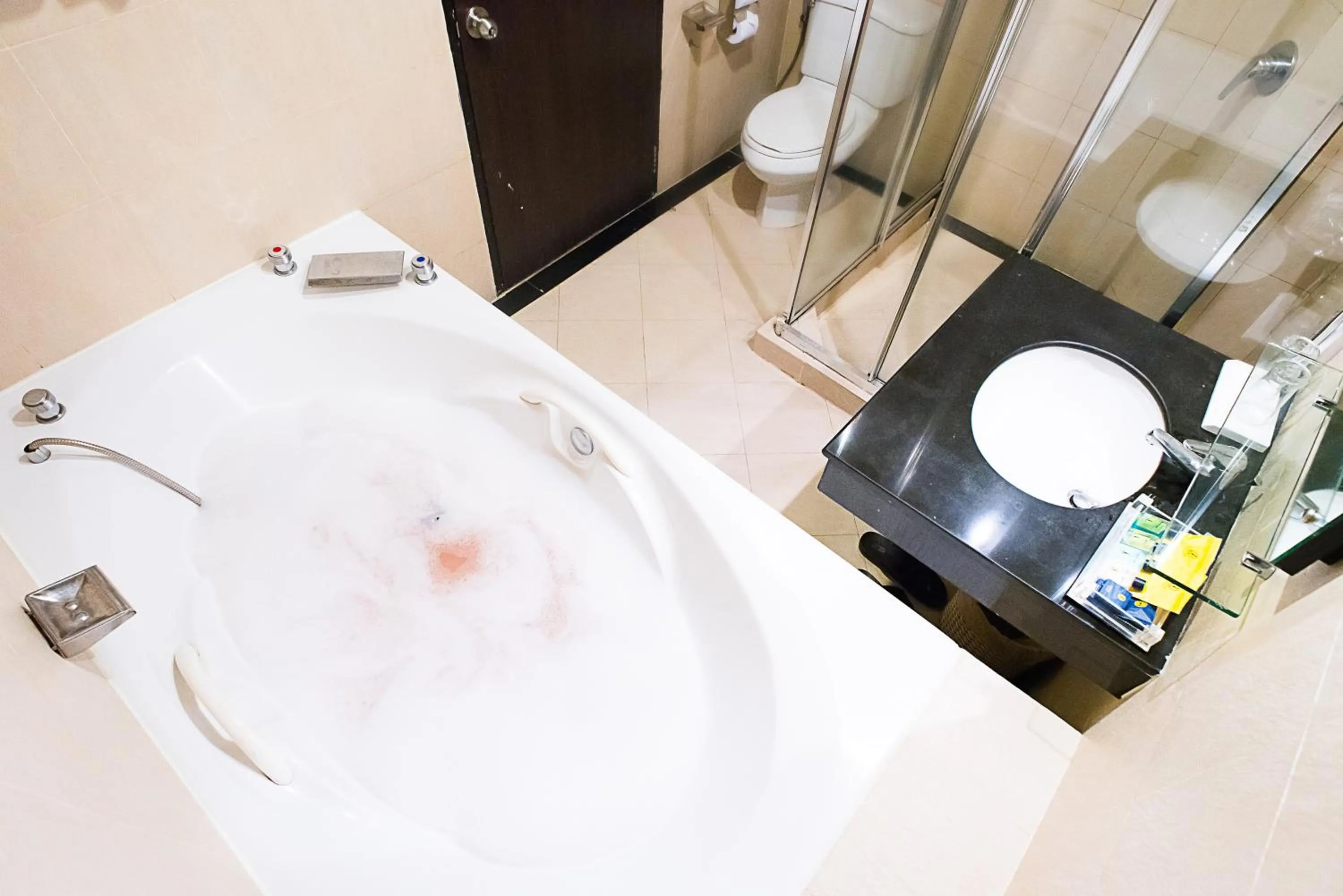 Bathroom in Intimate Hotel Pattaya - SHA Extra Plus