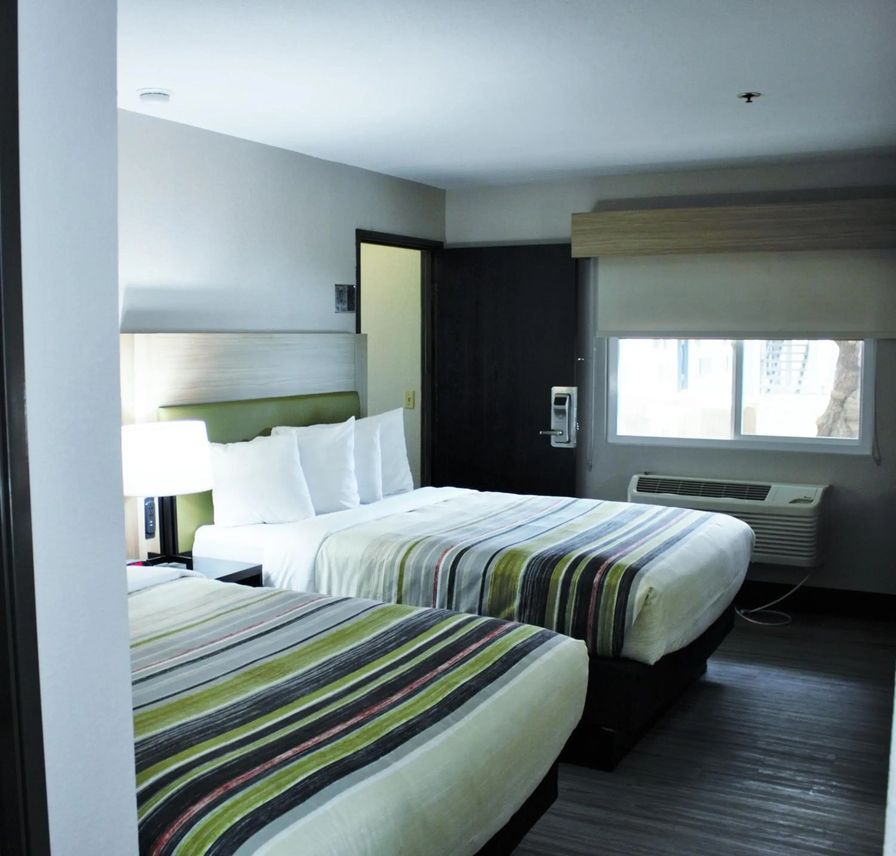 Bedroom, Bed in Country Inn & Suites by Radisson, Monterey Beachfront-Marina, CA Bedroom, Bed in Country Inn & Suites by Radisson, Monterey Beachfront-Marina, CA