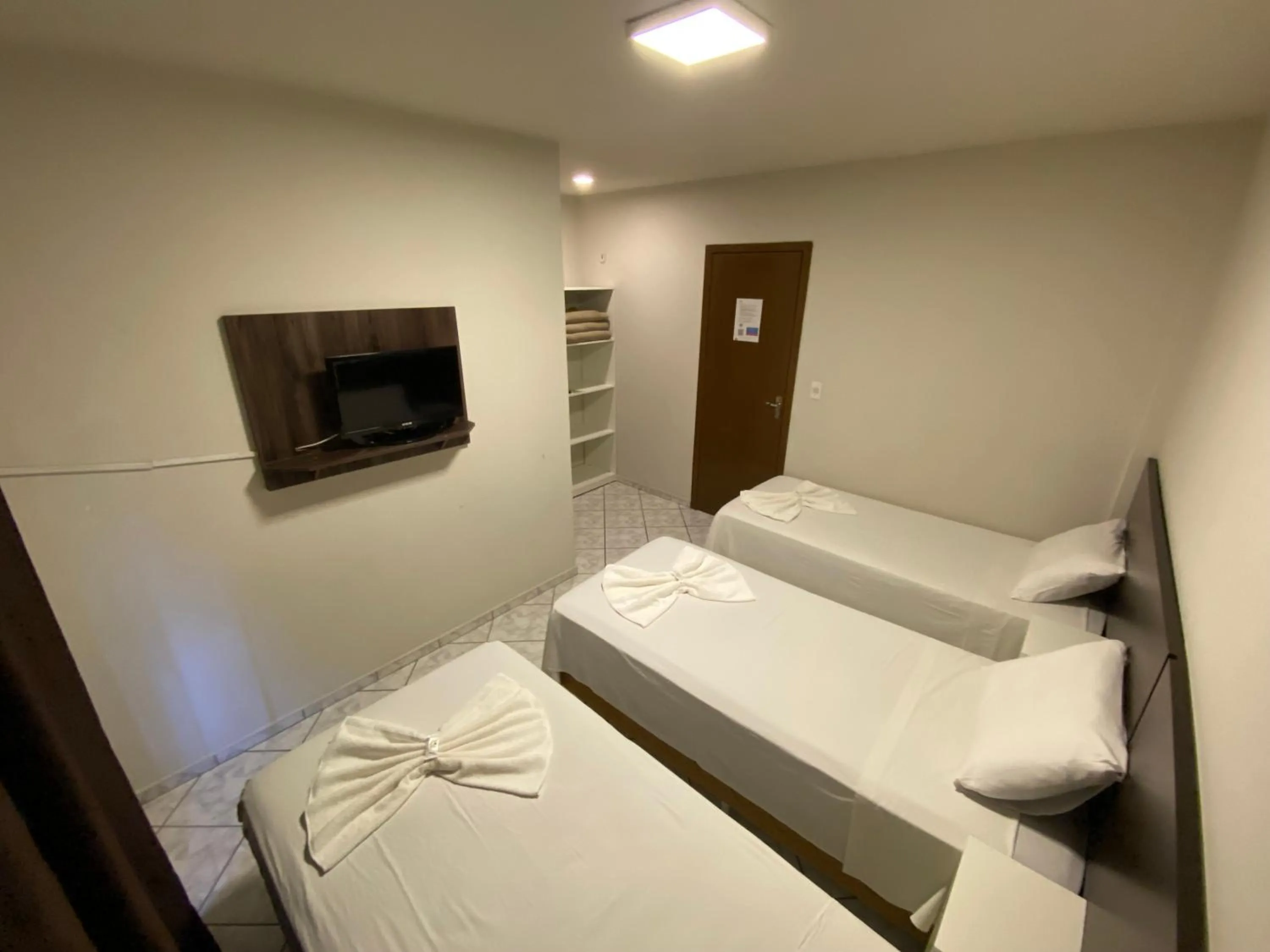 Bed in Pousada Cores