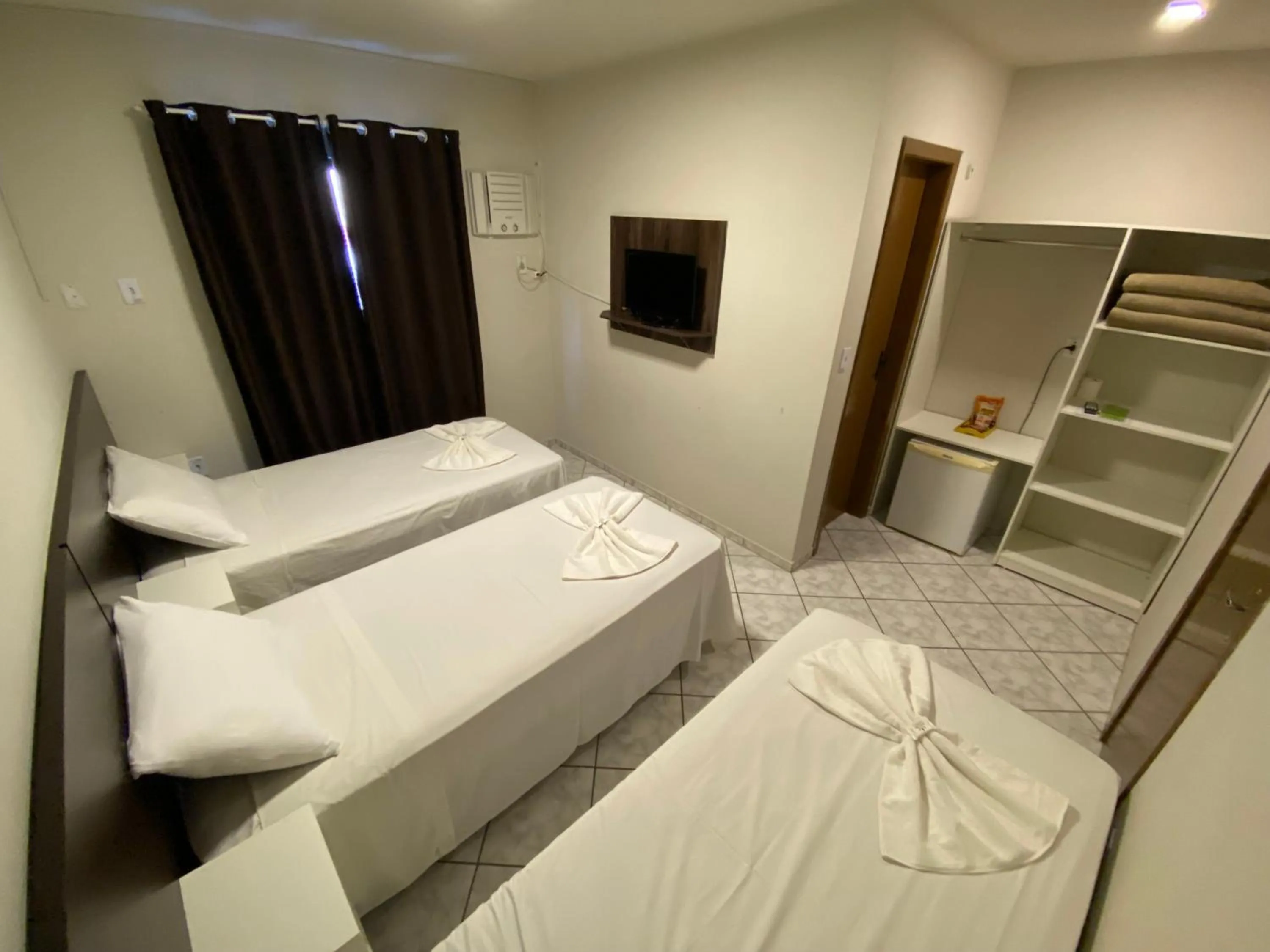 Bed in Pousada Cores