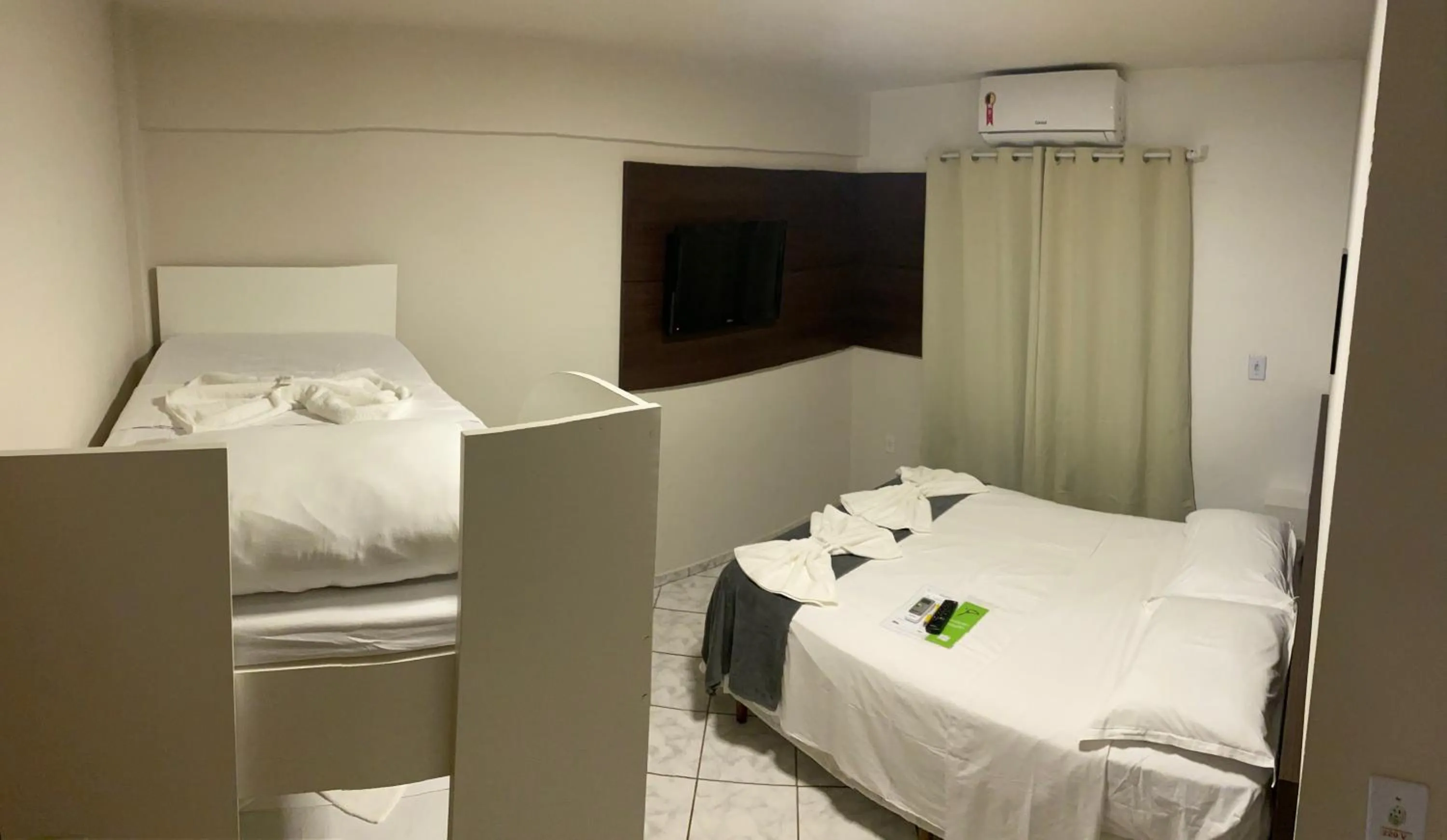 Bed in Pousada Cores