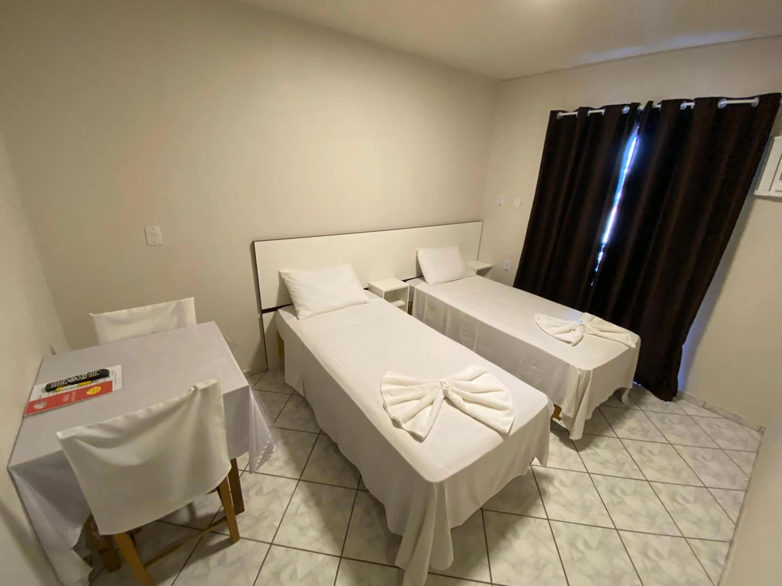 Bed in Pousada Cores