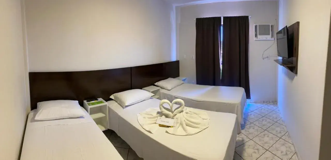 Bed in Pousada Cores Bed in Pousada Cores