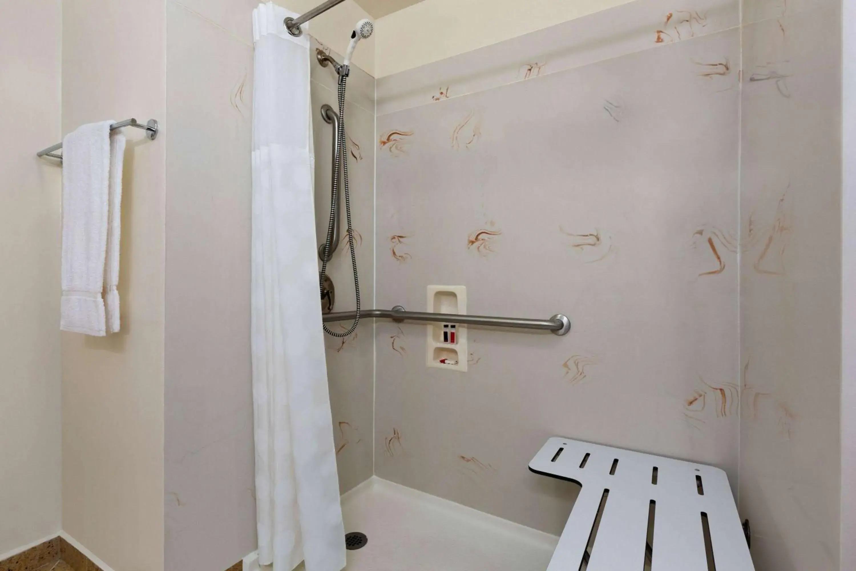 Bathroom in Ramada by Wyndham Oakland Downtown City Center Bathroom in Ramada by Wyndham Oakland Downtown City Center