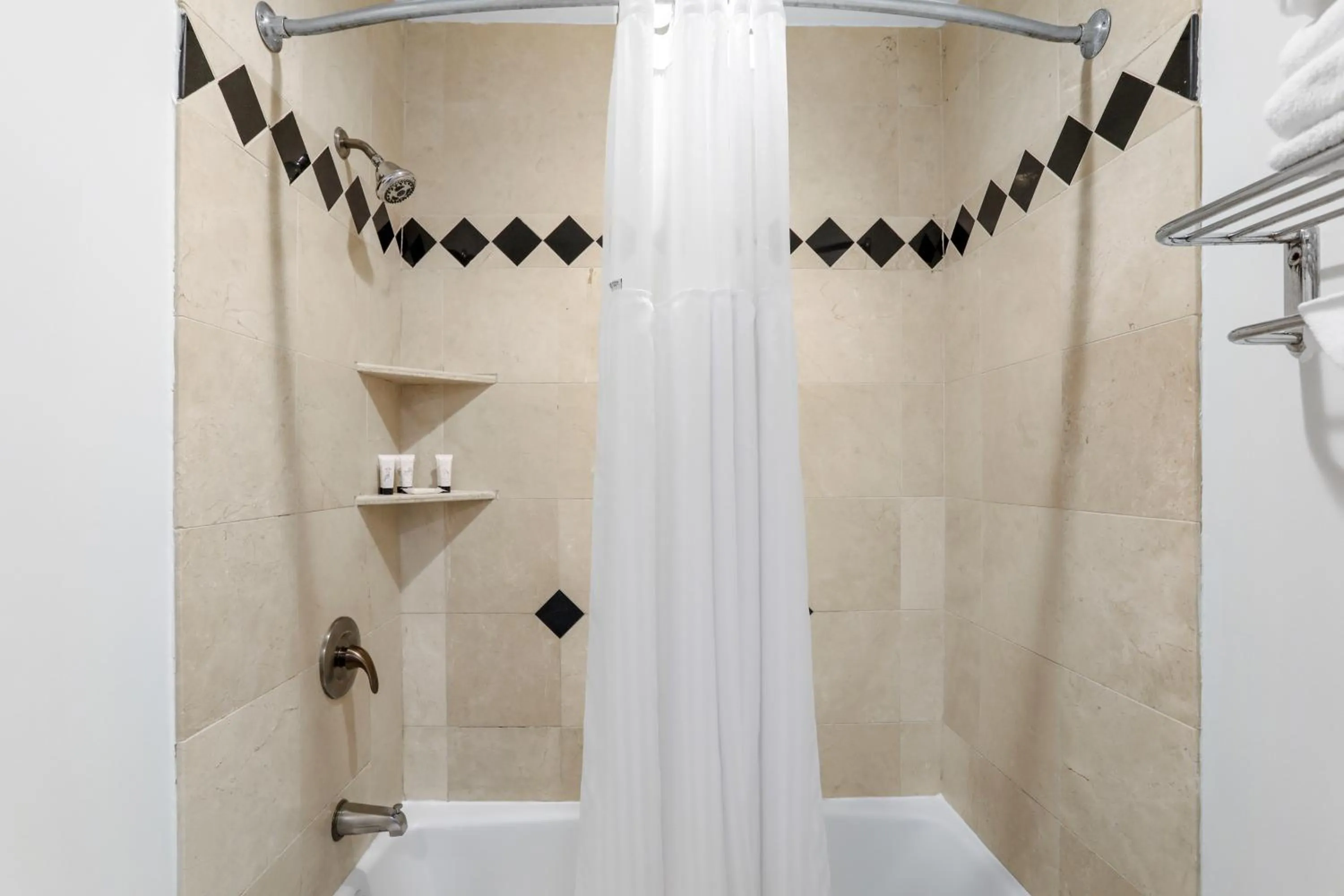 Shower in Signature Inn Berkeley