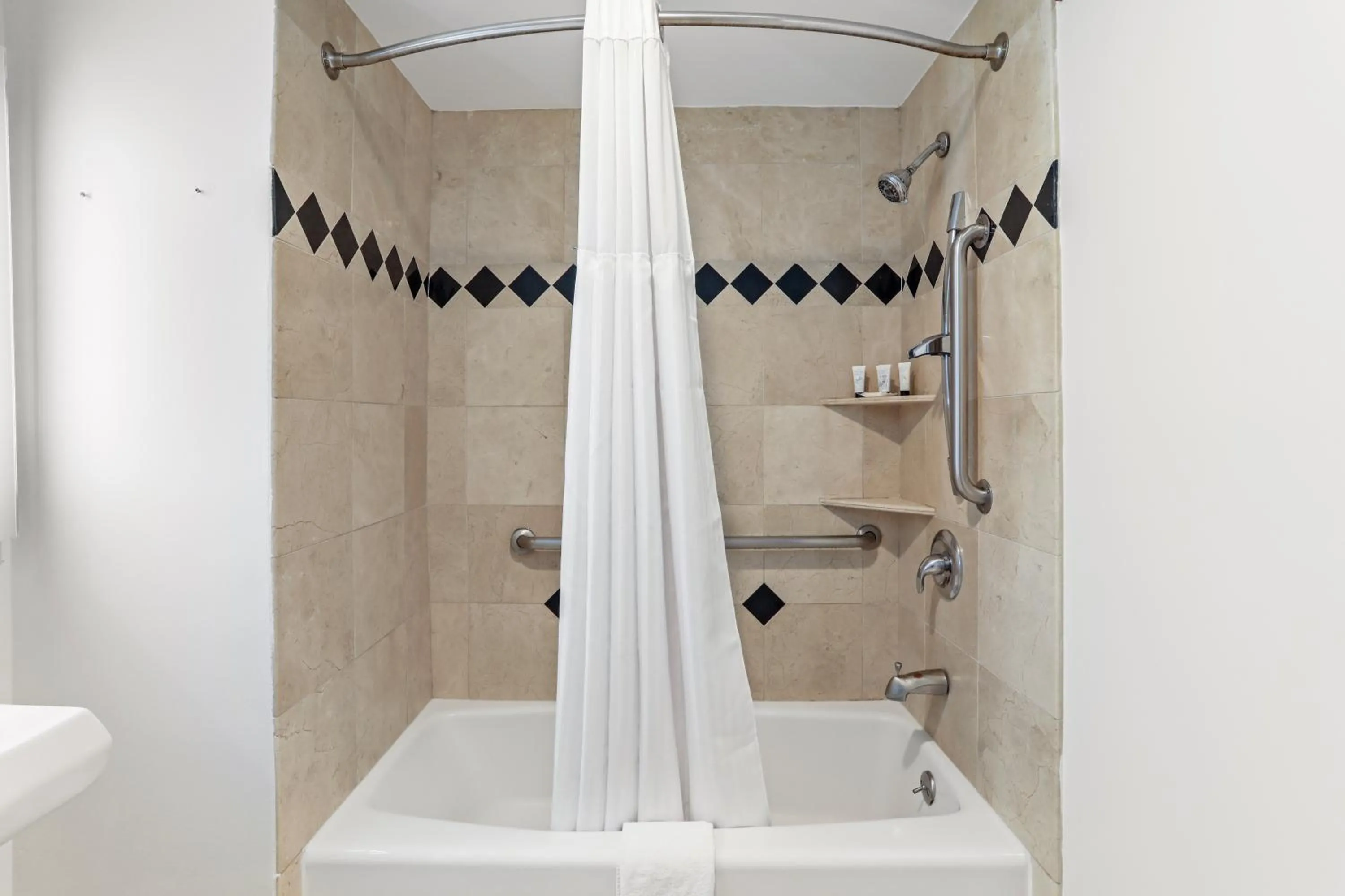 Shower in Signature Inn Berkeley