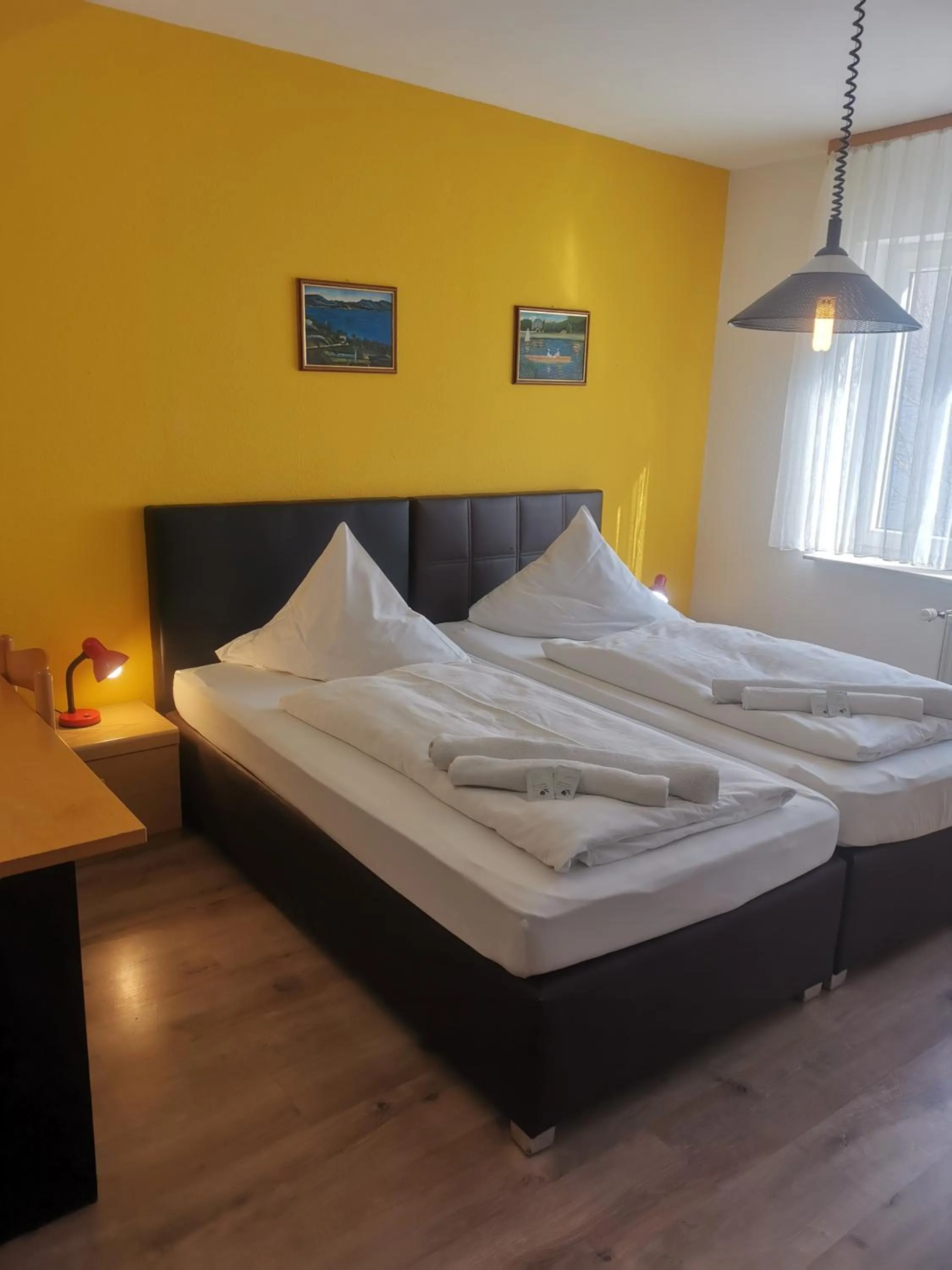 Photo of the whole room, Bed in Hotel Arheilger Hof